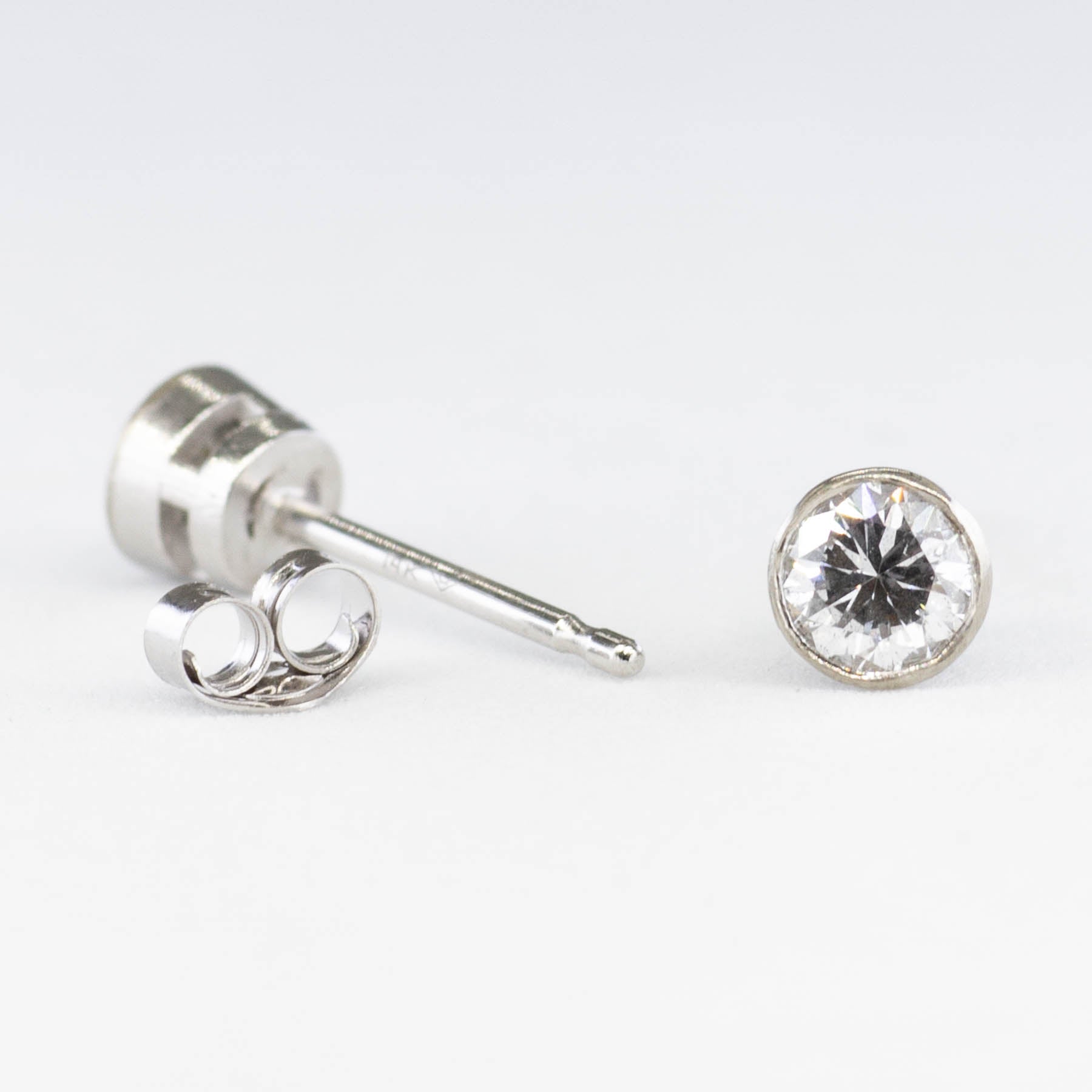 '100 Ways' White Gold Bezel Set Diamond Studs | 1/3 ctw |