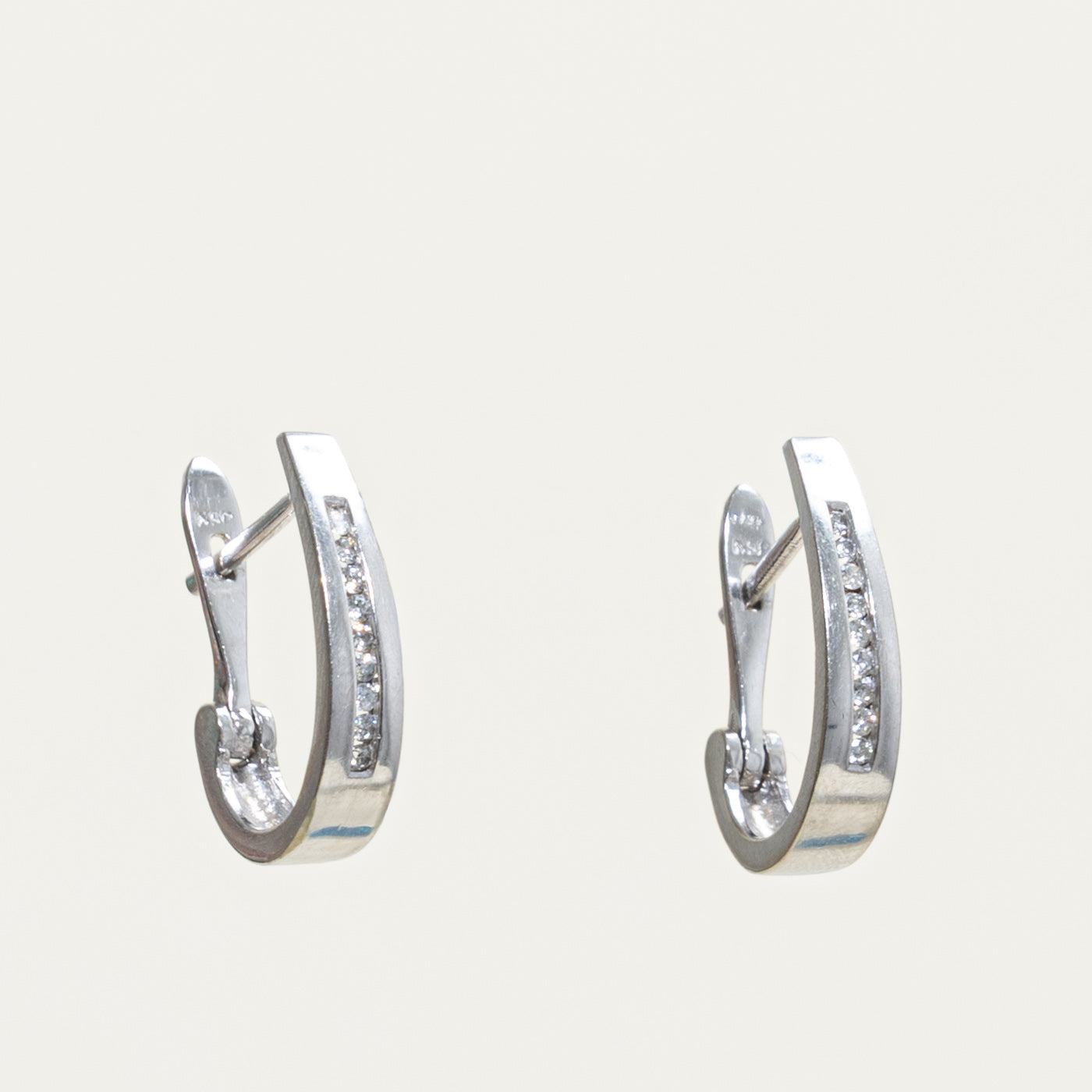 10k Diamond Channel Set Huggies Earrings | 0.10ctw