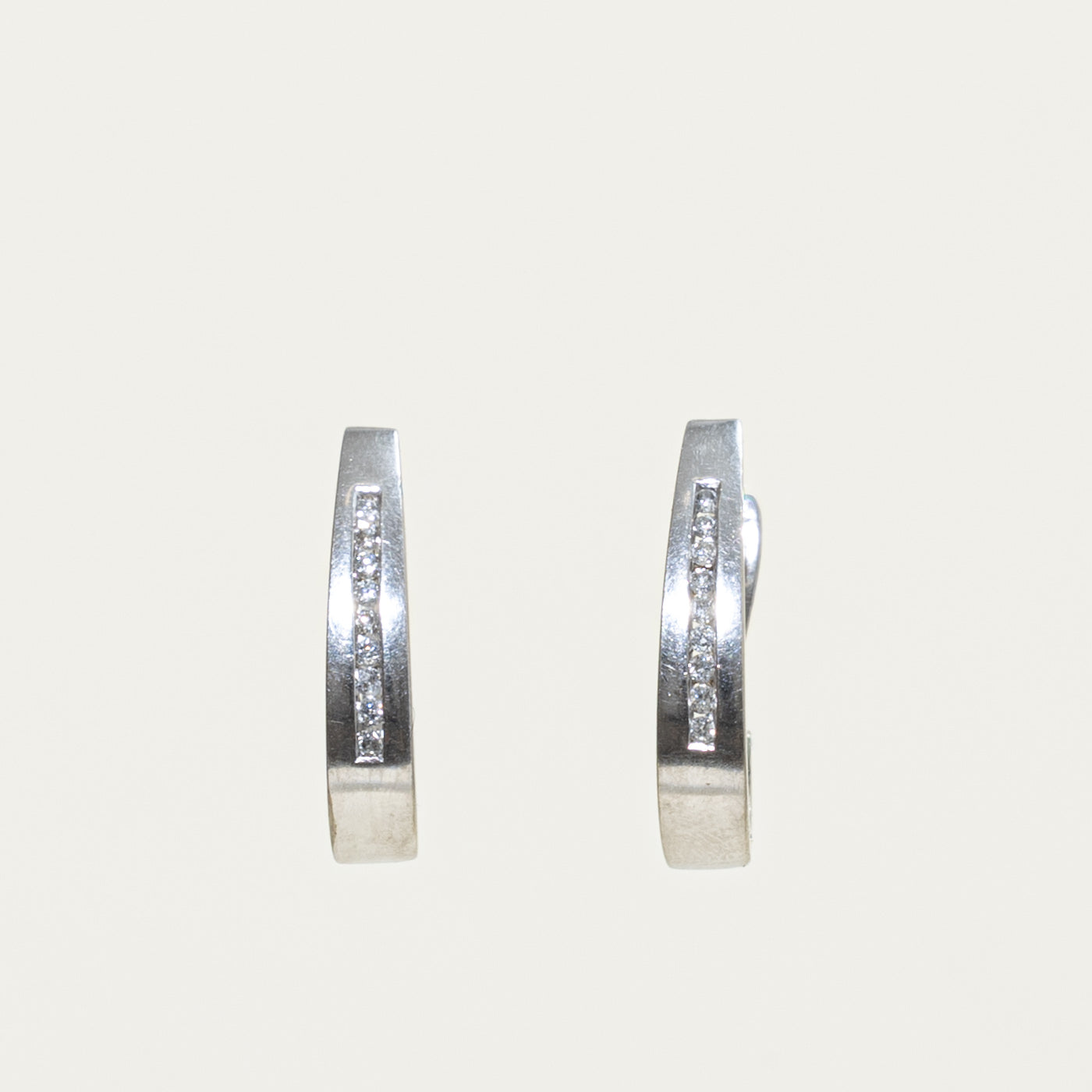 10k Diamond Channel Set Huggies Earrings | 0.10ctw