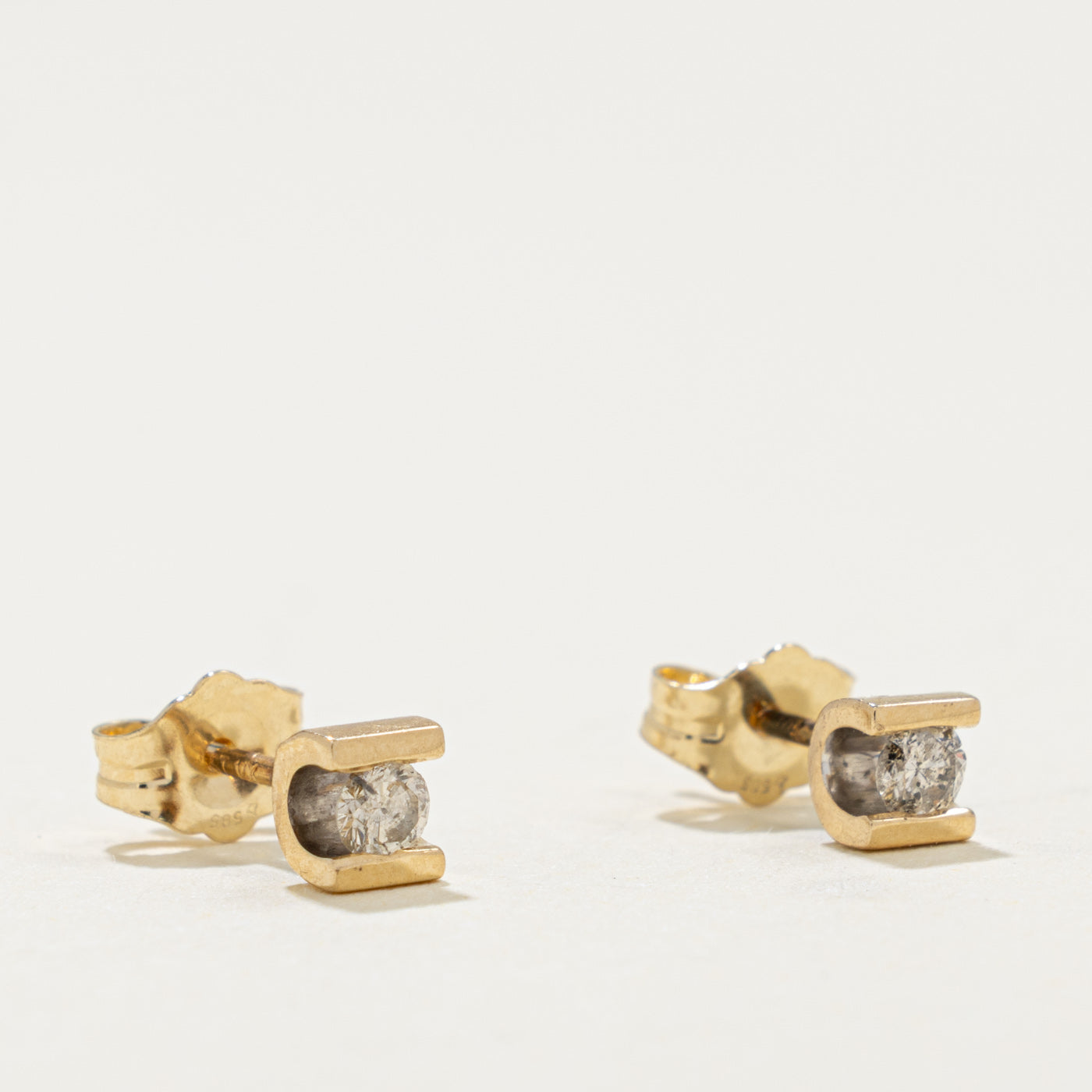 14k Tension Set Diamond Stud Earrings | 0.16ctw