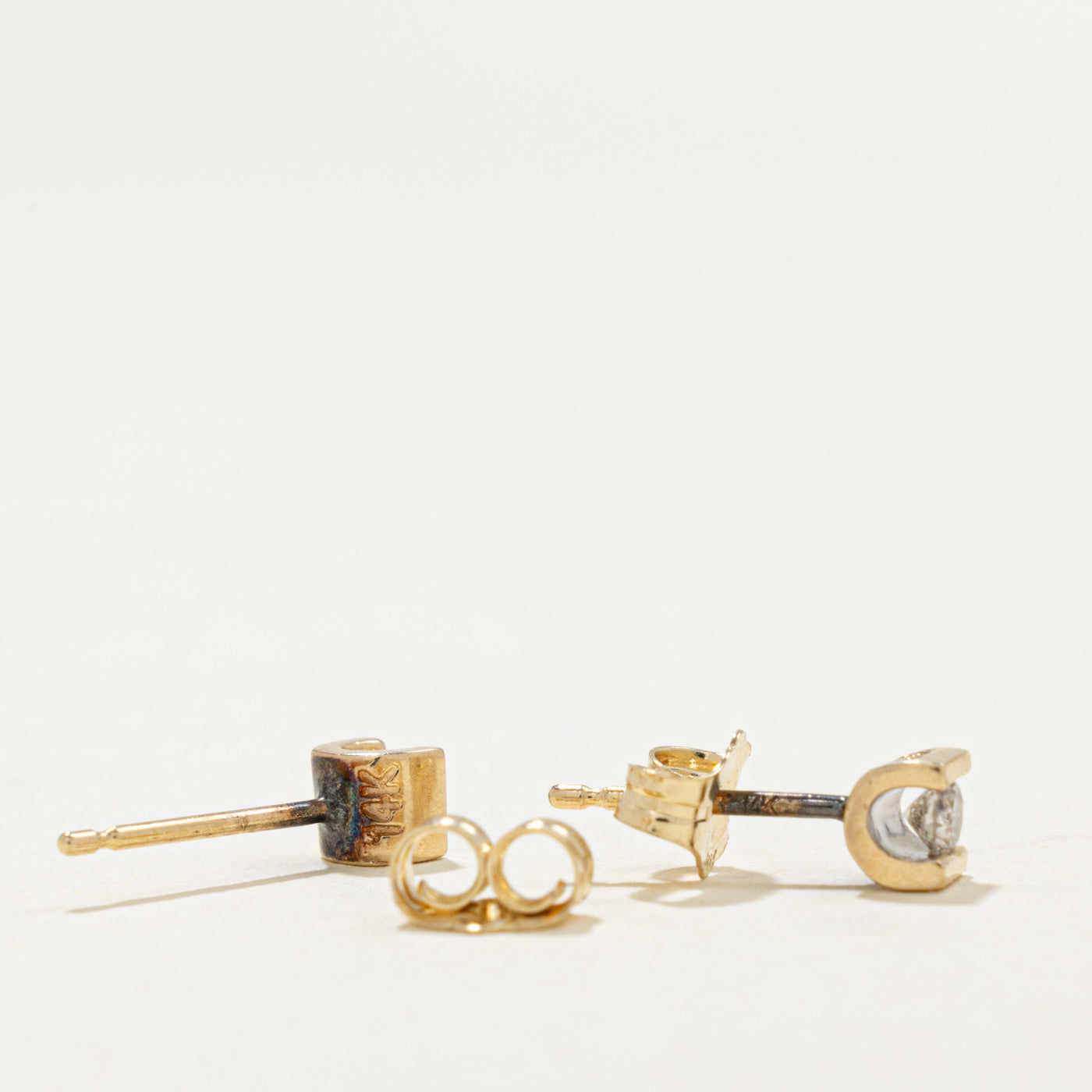 14k Tension Set Diamond Stud Earrings | 0.16ctw