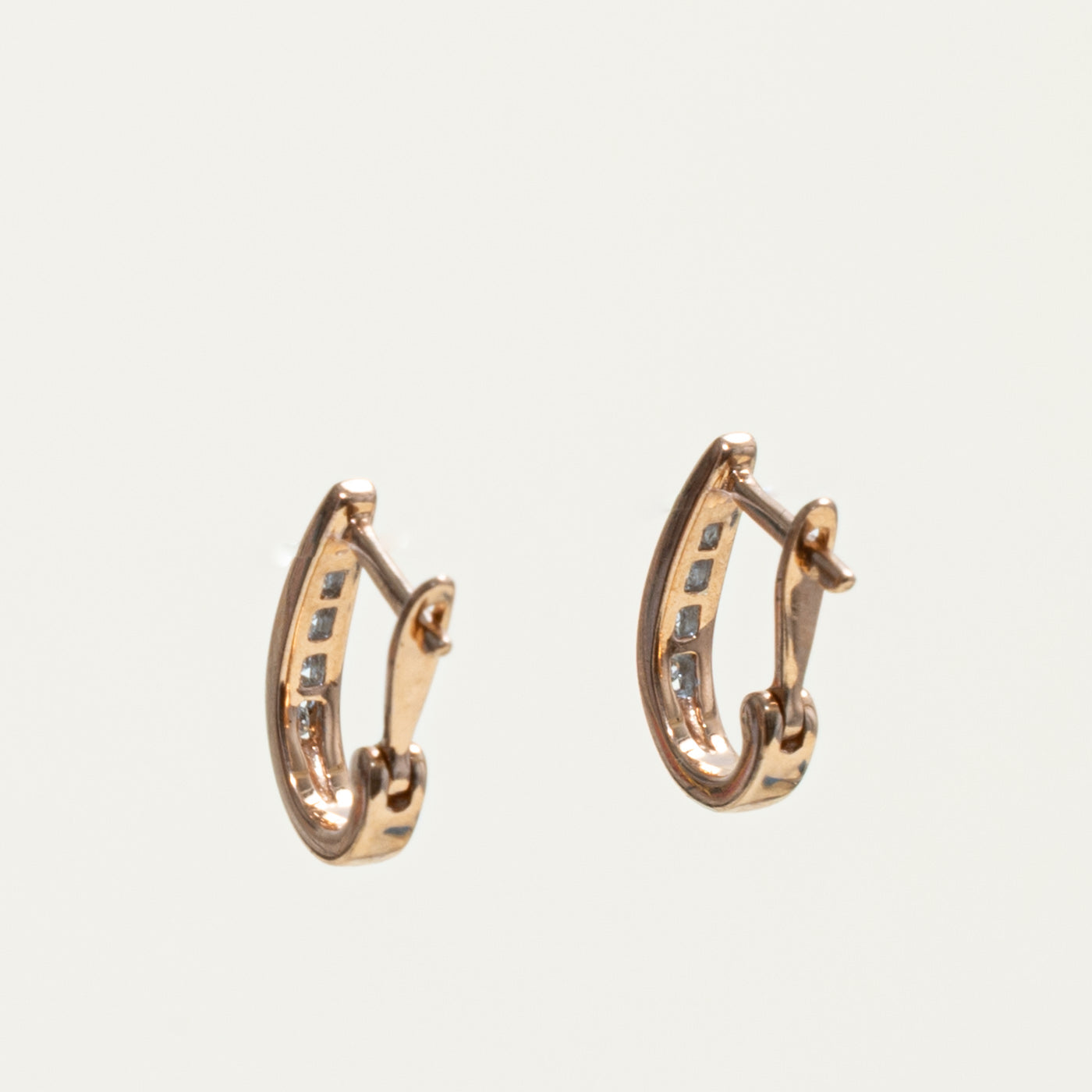 10k Channel Set Diamond Oval Hoop Earrings | 0.14ctw