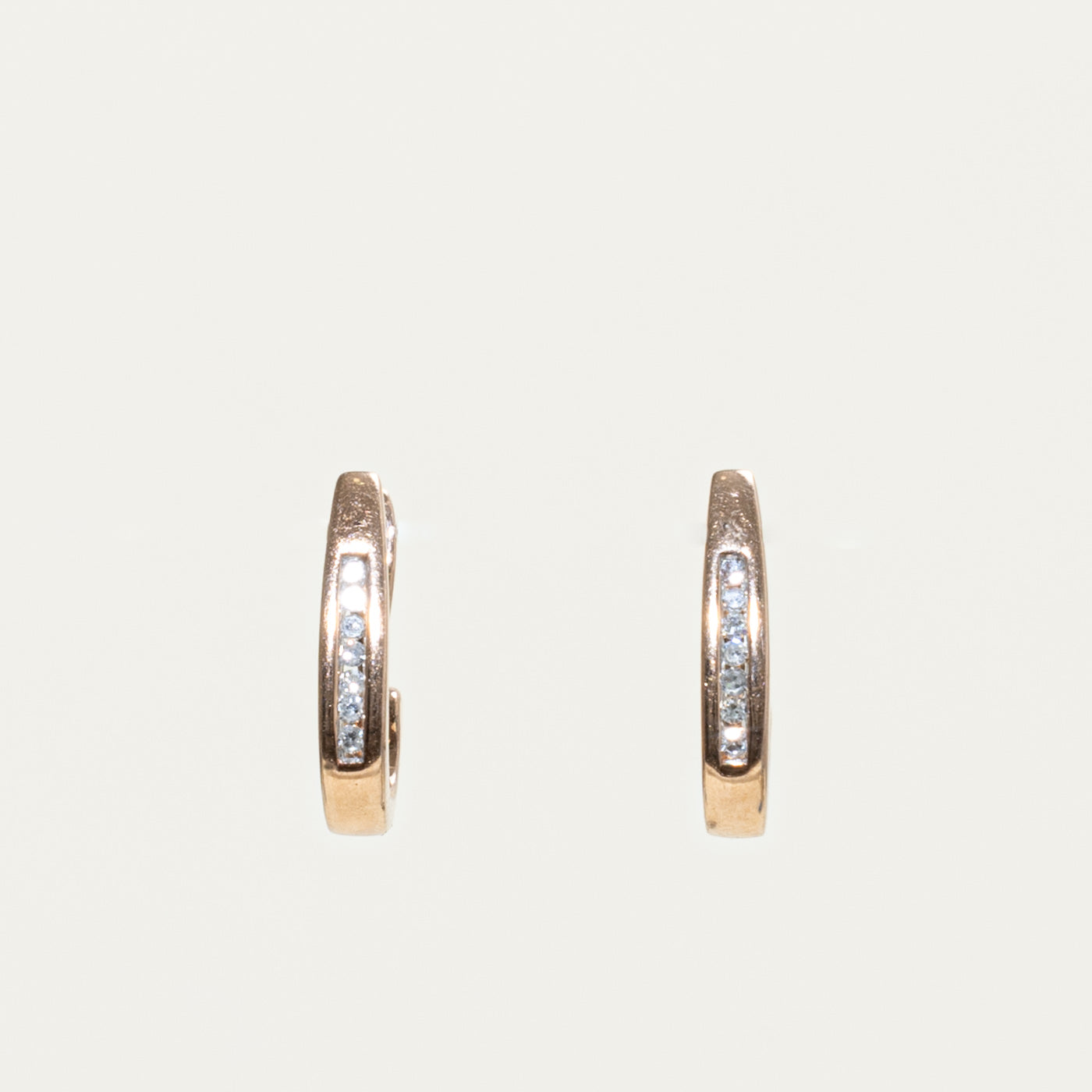 10k Channel Set Diamond Oval Hoop Earrings | 0.14ctw