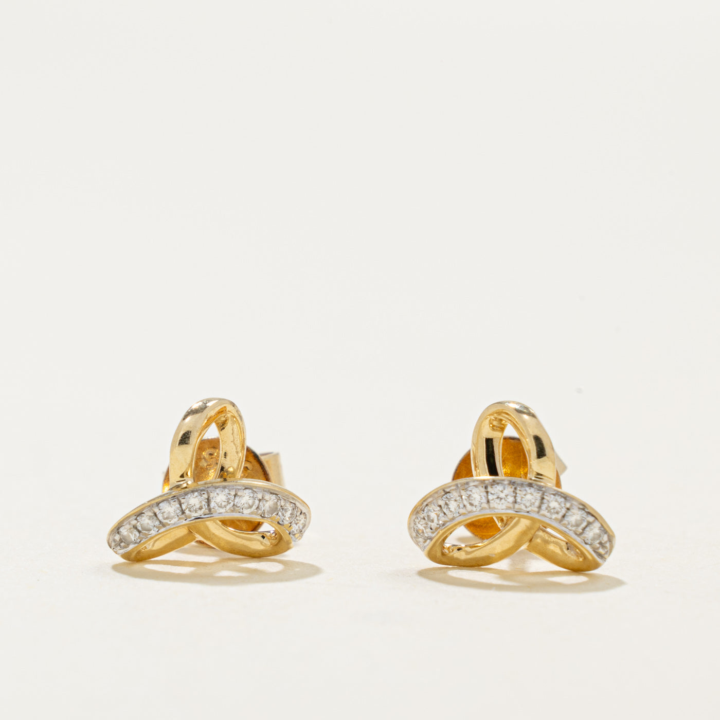 14k Diamond Accented Knot Stud Earrings | 0.10ctw