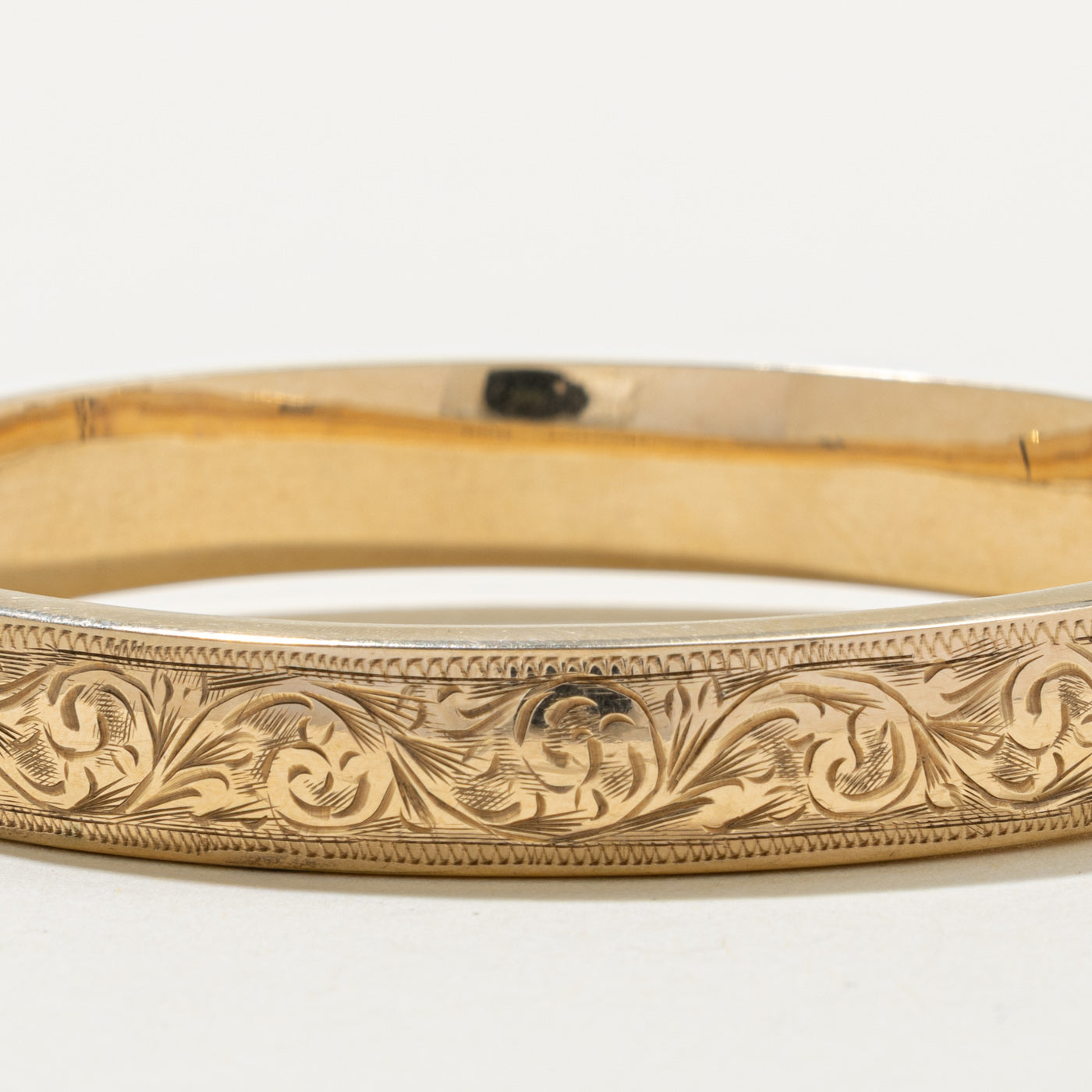 'Birks' Yellow Gold Engraved Floral Bangle | 7"