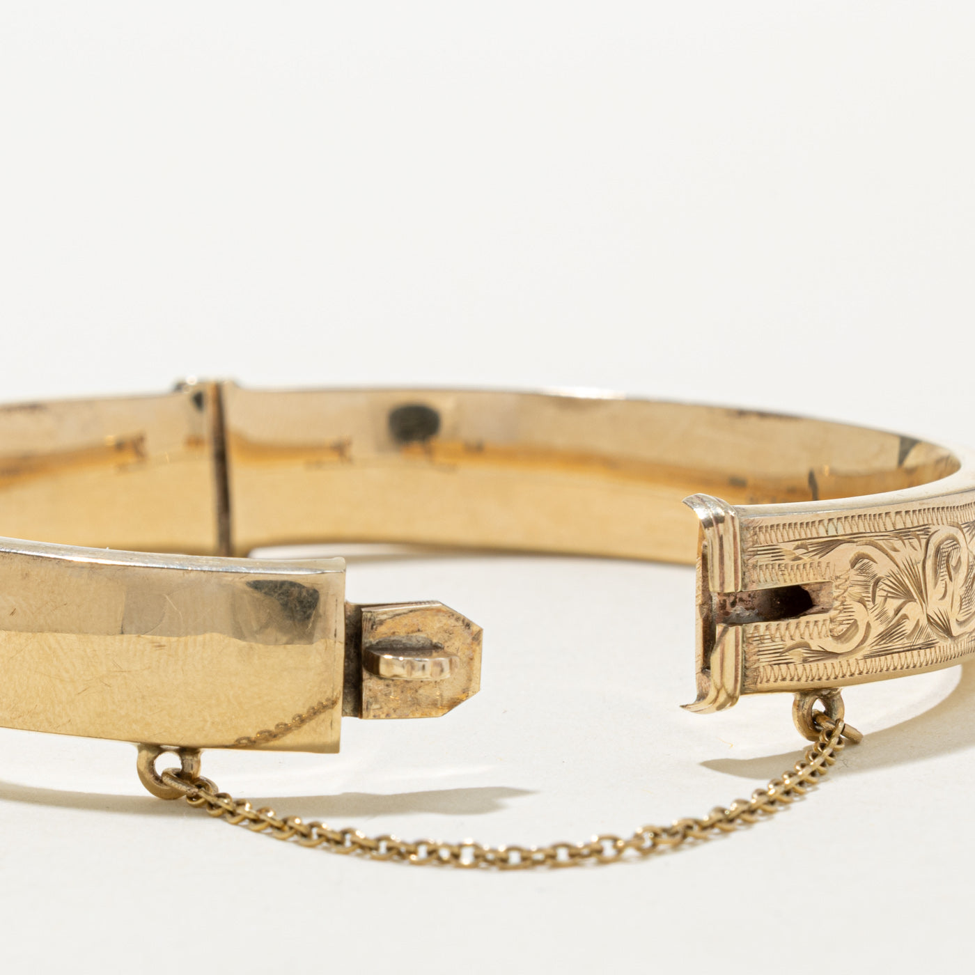 'Birks' Yellow Gold Engraved Floral Bangle | 7"