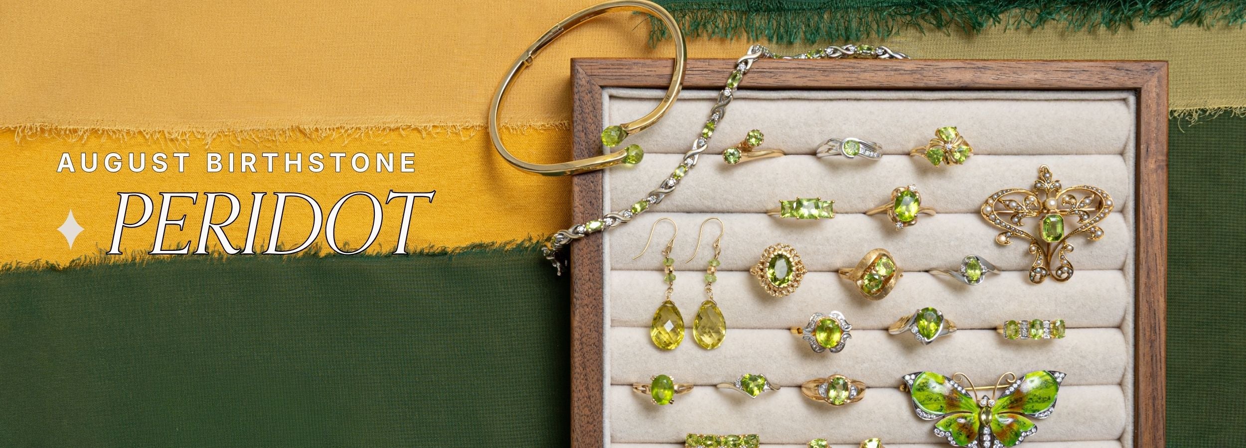 A jewelry tray showing multiple rings, earrings, and a bracelet with green peridot accents, alongside a gold bangle and chain. The left side includes text reading 'AUGUST BIRTHSTONE PERIDOT' over a yellow and dark green background.