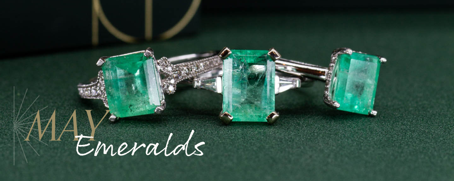 Image of three emerald cut emerald gemstone, vintage rings. Text reads: May Emeralds