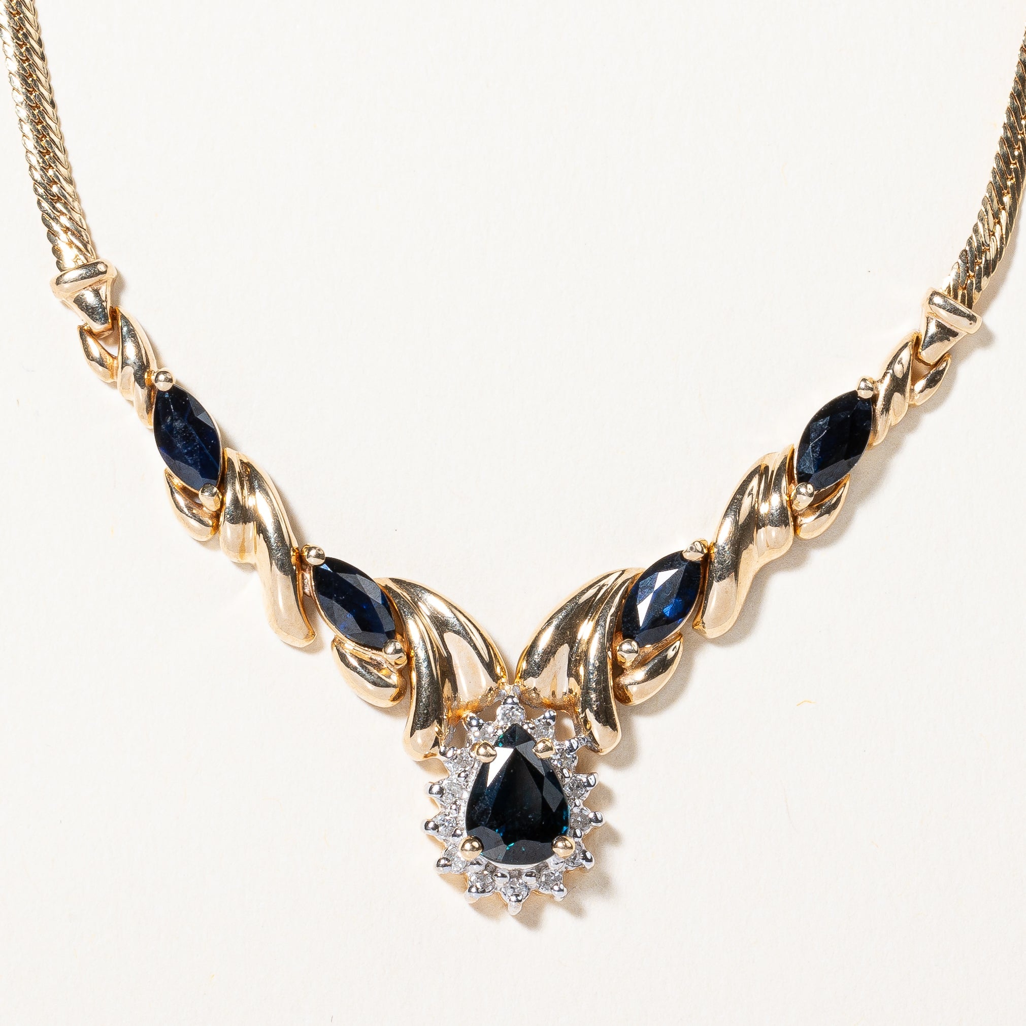 Sapphire & Diamond Scoop Pendant Necklace | 1.50ctw, 0.04ctw | 16" |