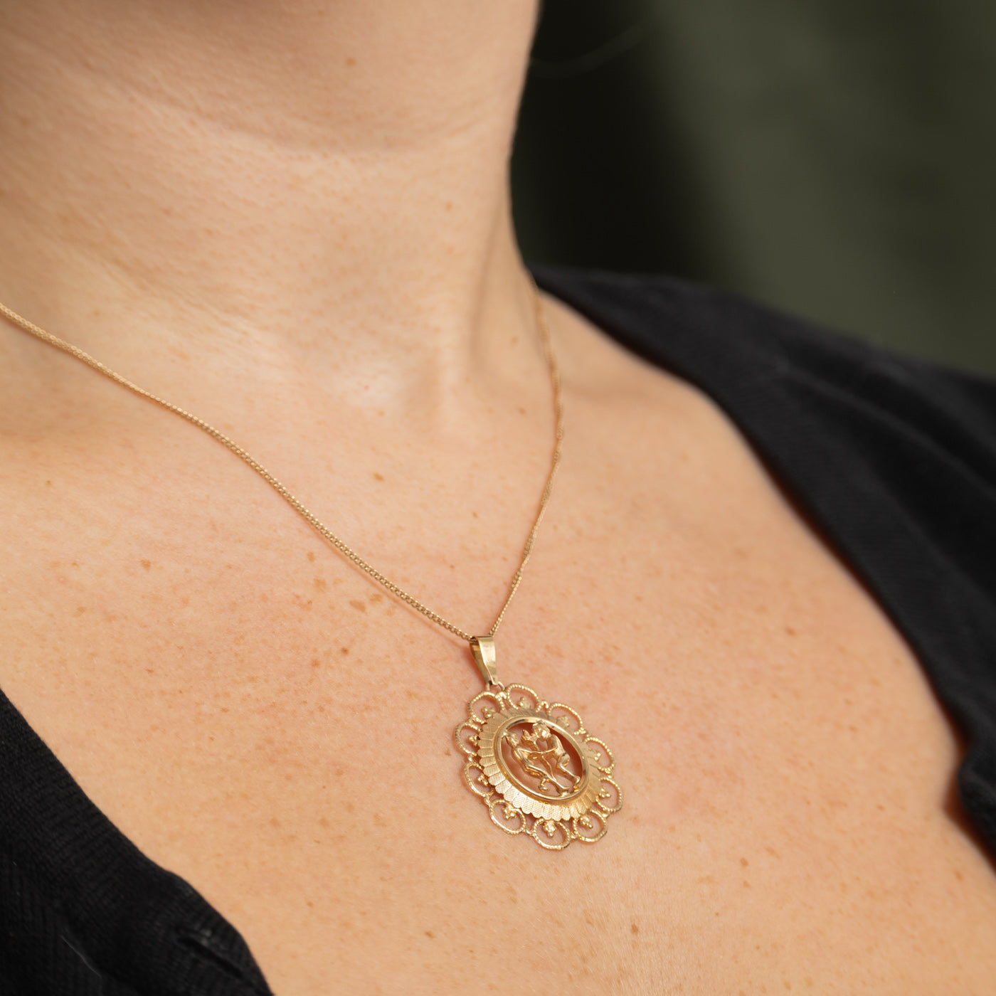 10k Yellow Gold Figures Pendant