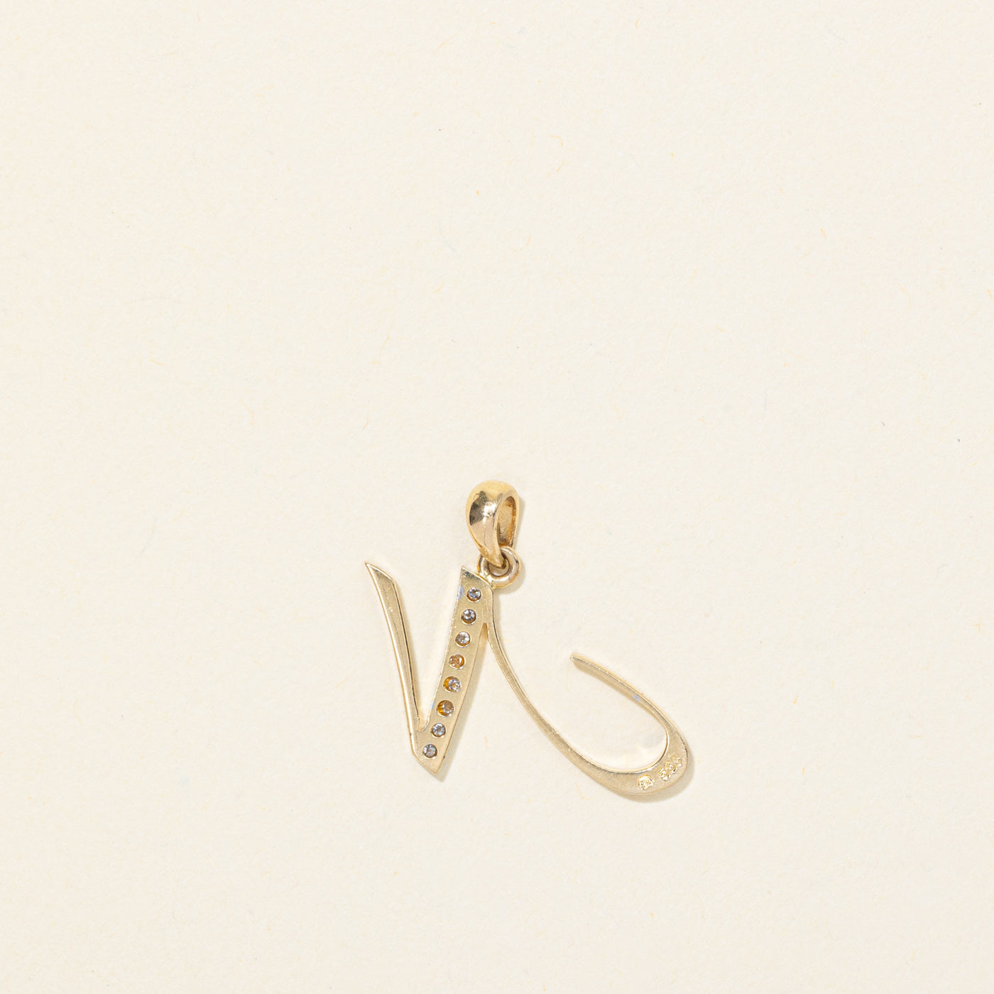 Pendentif initial « N » en diamant 14 carats