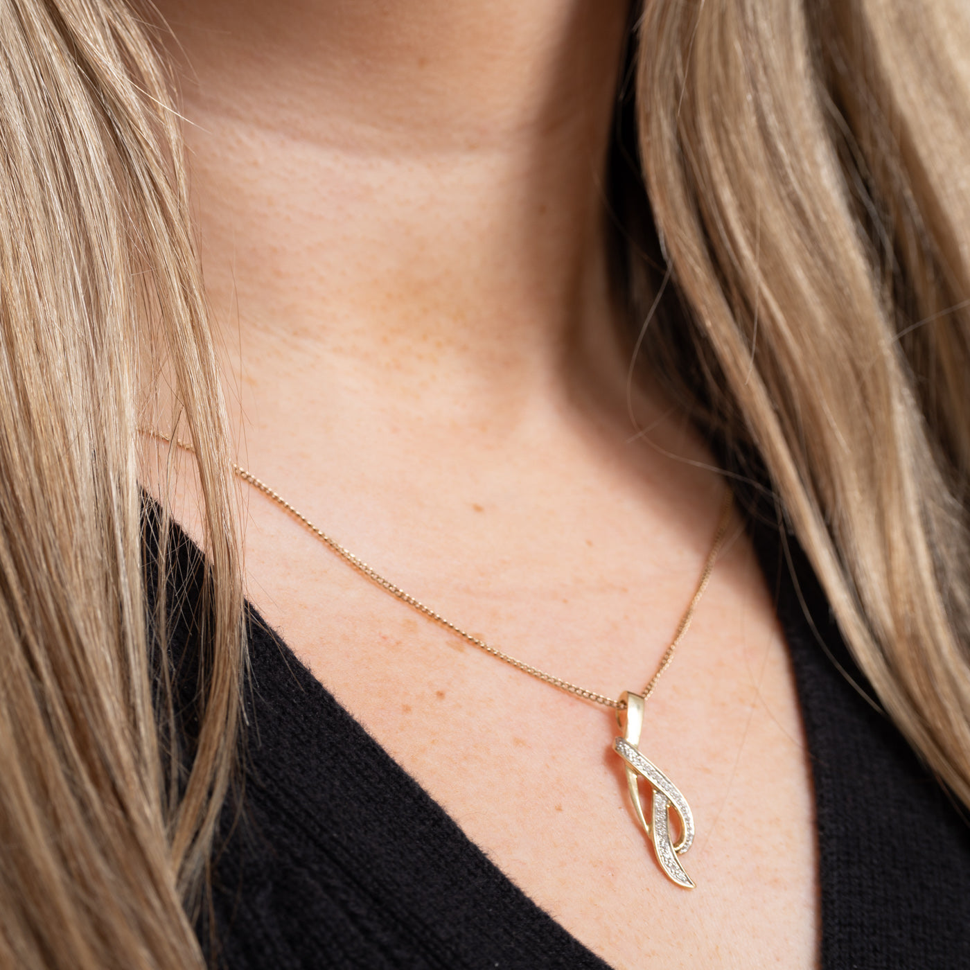 10K Diamond Infinity Cross Over Pendant