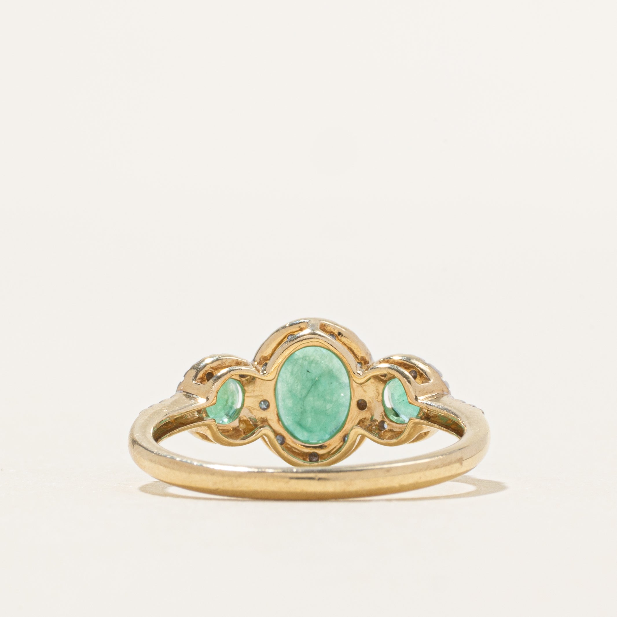 Three Stone Emerald & Diamond Halo Ring | 0.85ctw, 0.06ctw | SZ 7
