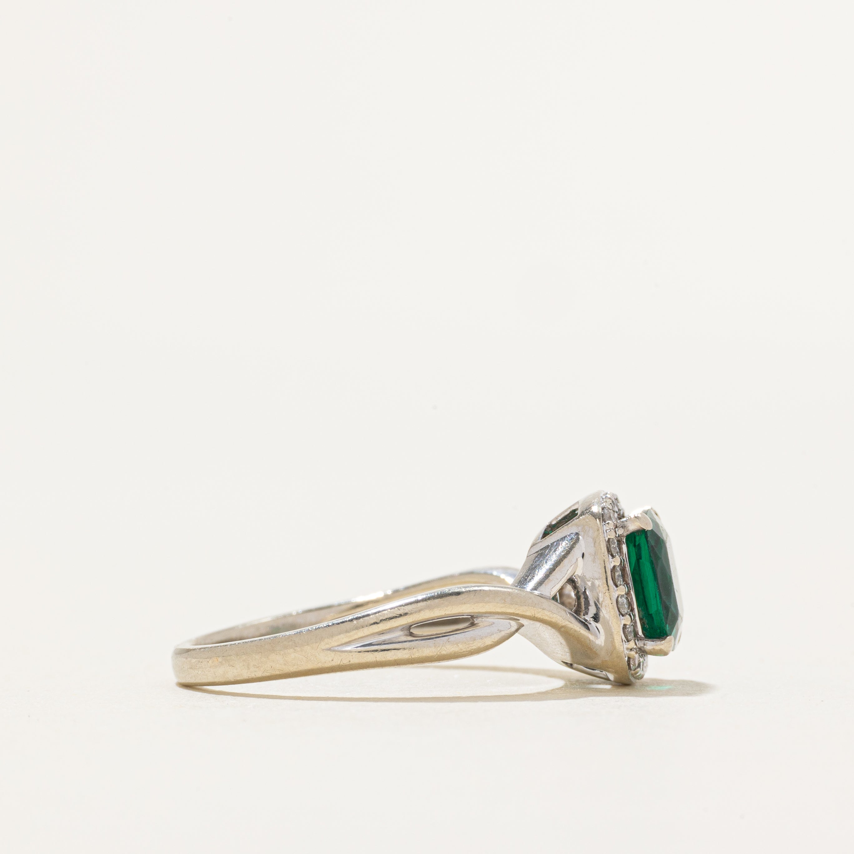 Synthetic Emerald & Diamond Halo Cross Over Ring | 1.10ct, 0.04ctw | SZ 7