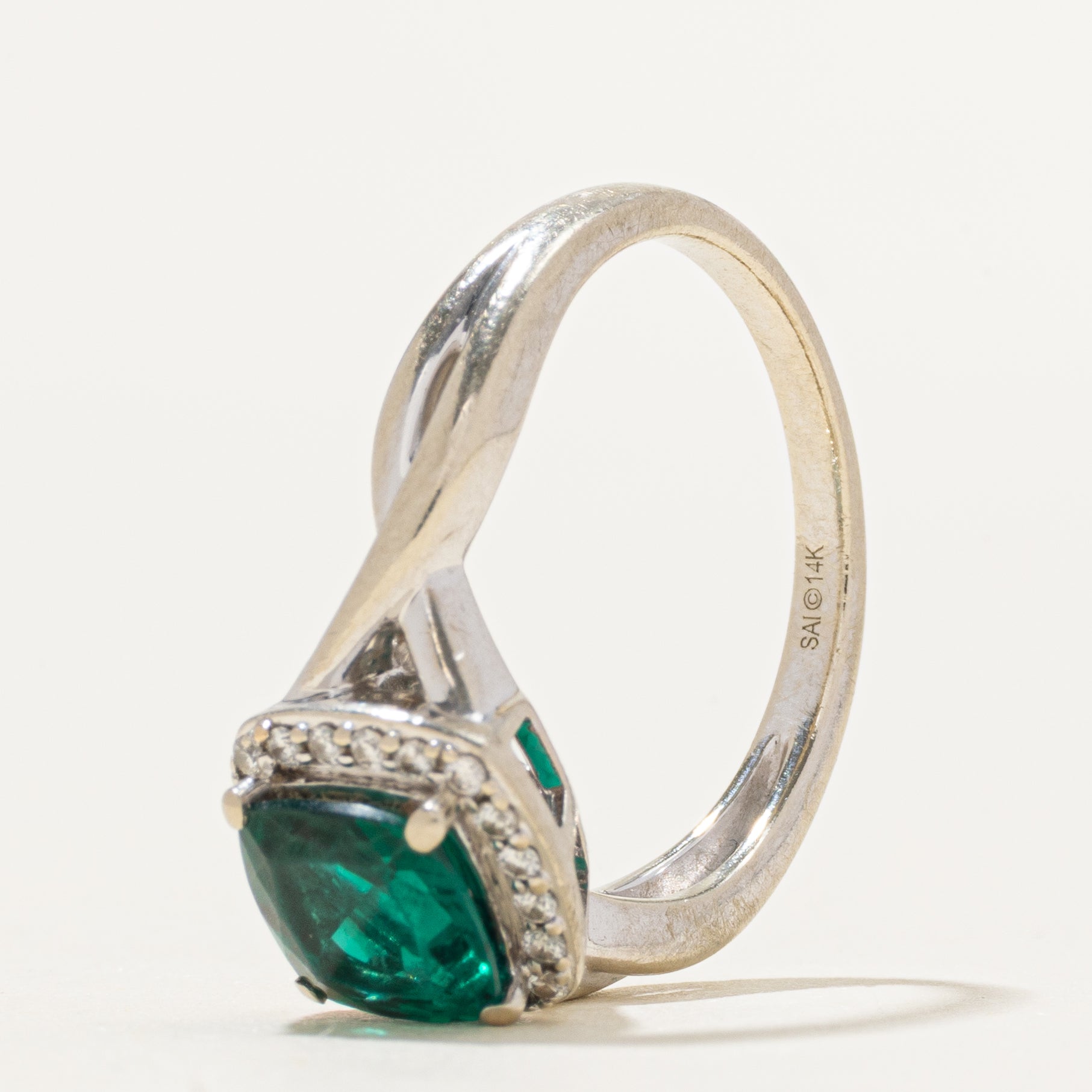 Synthetic Emerald & Diamond Halo Cross Over Ring | 1.10ct, 0.04ctw | SZ 7