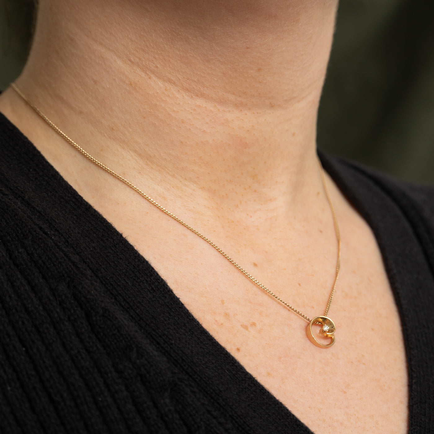 10K Diamond Swirl Circle Pendant