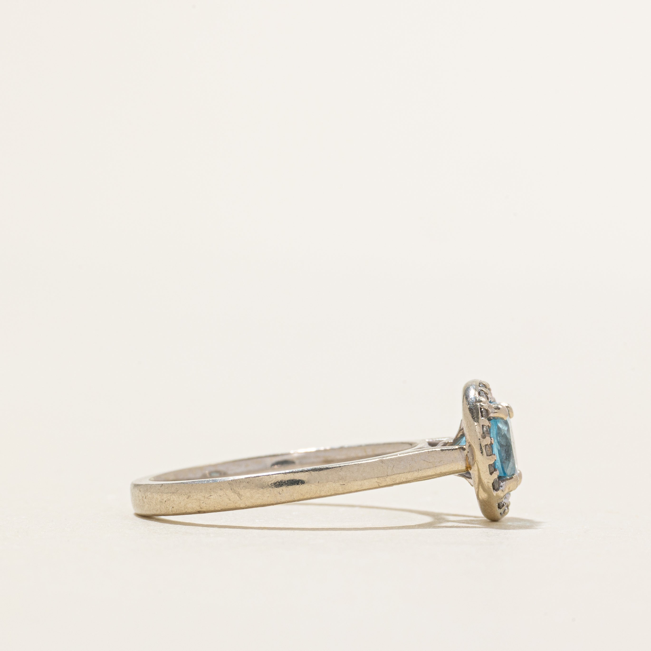 White Gold Blue Topaz & Diamond Halo Ring | 1.00ct, 0.08ctw | SZ 6.75