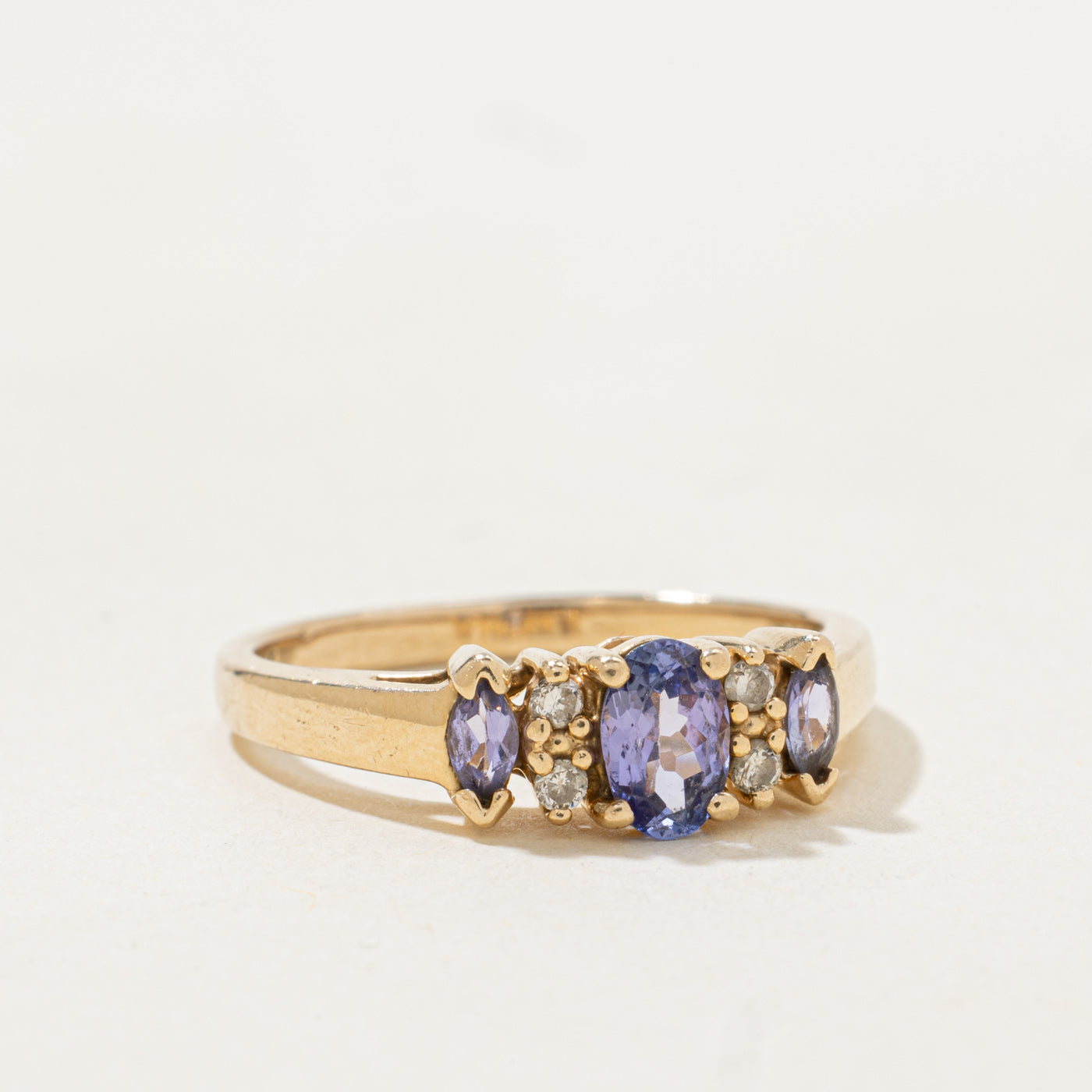 Three Stone Tanzanite & Diamond Ring | 0.7ctw, 0.02ctw | SZ 6.75 |
