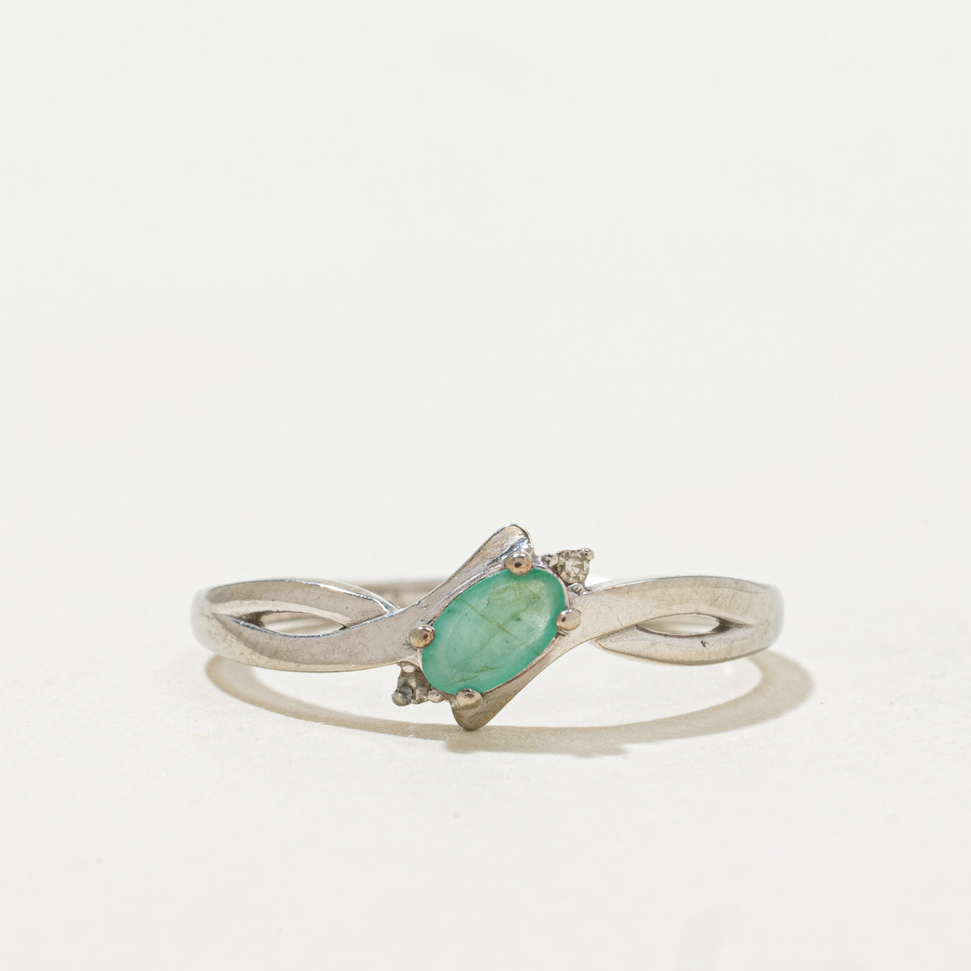 Oval Cut Emerald & Diamond Bypass Ring | 0.12ct, 0.01ctw | SZ 6.25 |