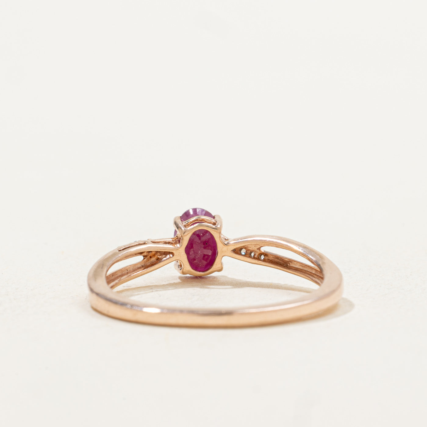 Oval Cut Ruby & Diamond Cross Over Ring | 0.52ct, 0.01ctw | SZ 7.0 |