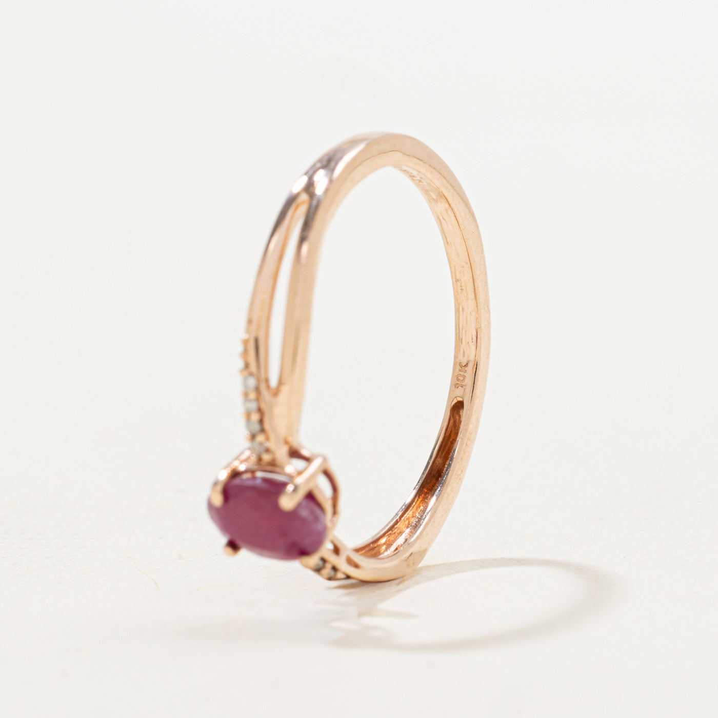 Oval Cut Ruby & Diamond Cross Over Ring | 0.52ct, 0.01ctw | SZ 7.0 |