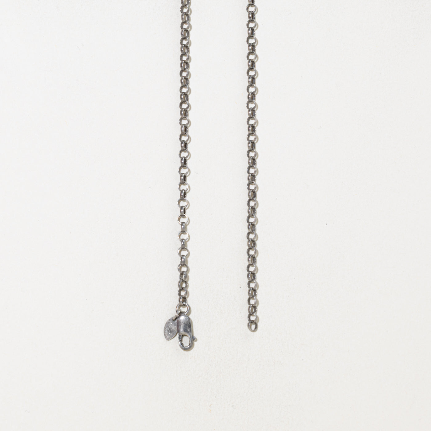 Sterling Silver Blue Topaz Pisces Pendant Necklace | 0.25ctw | 22.5"