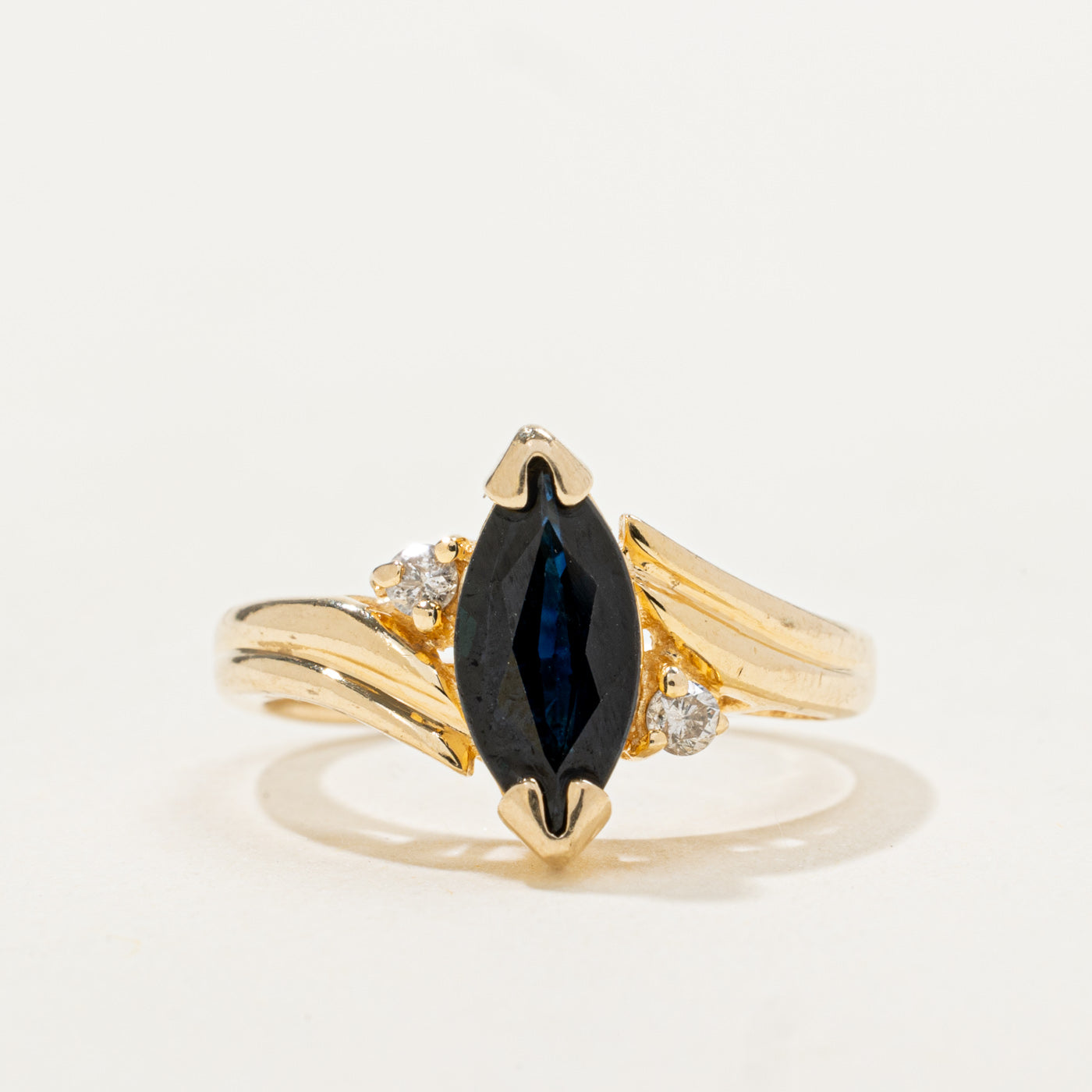 Marquise Cut Sapphire & Diamond Grooved Bypass Ring | 0.82ctw, 0.05ctw | SZ 3.75 |