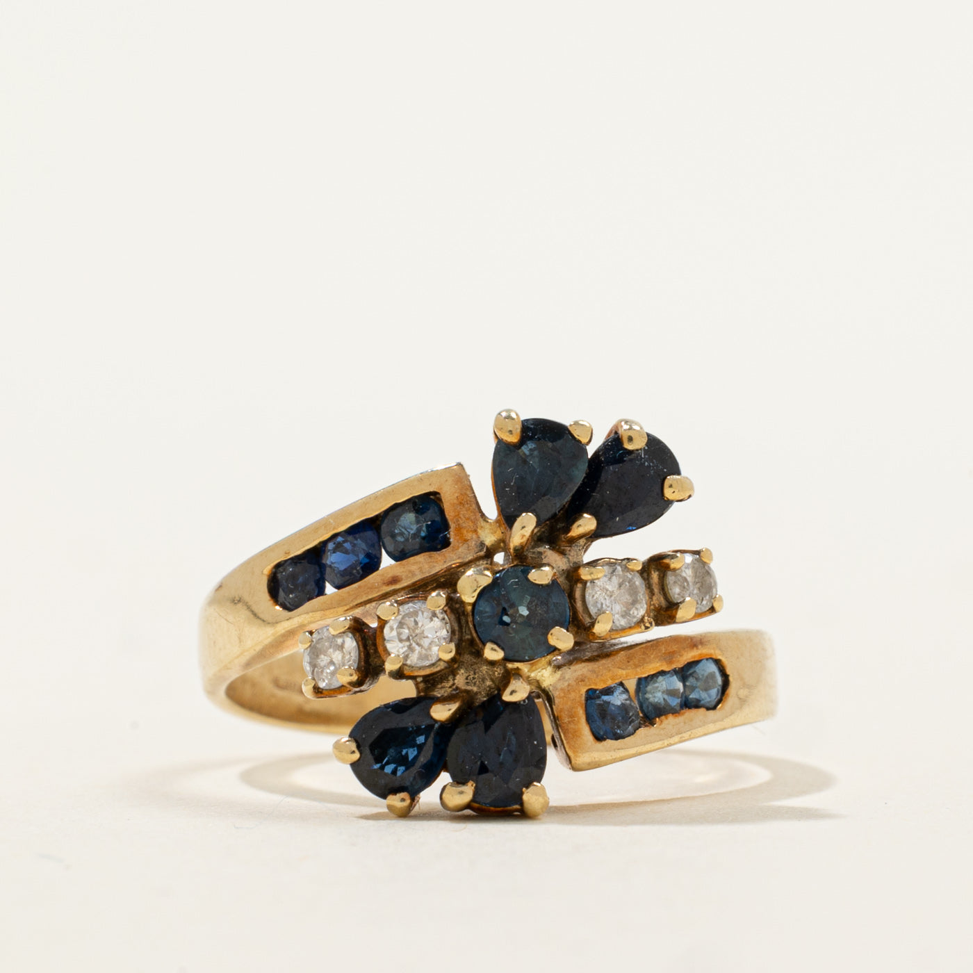 Unique Sapphire & Diamond Bypass Ring | 0.72ctw, 0.12ctw | SZ 8 |