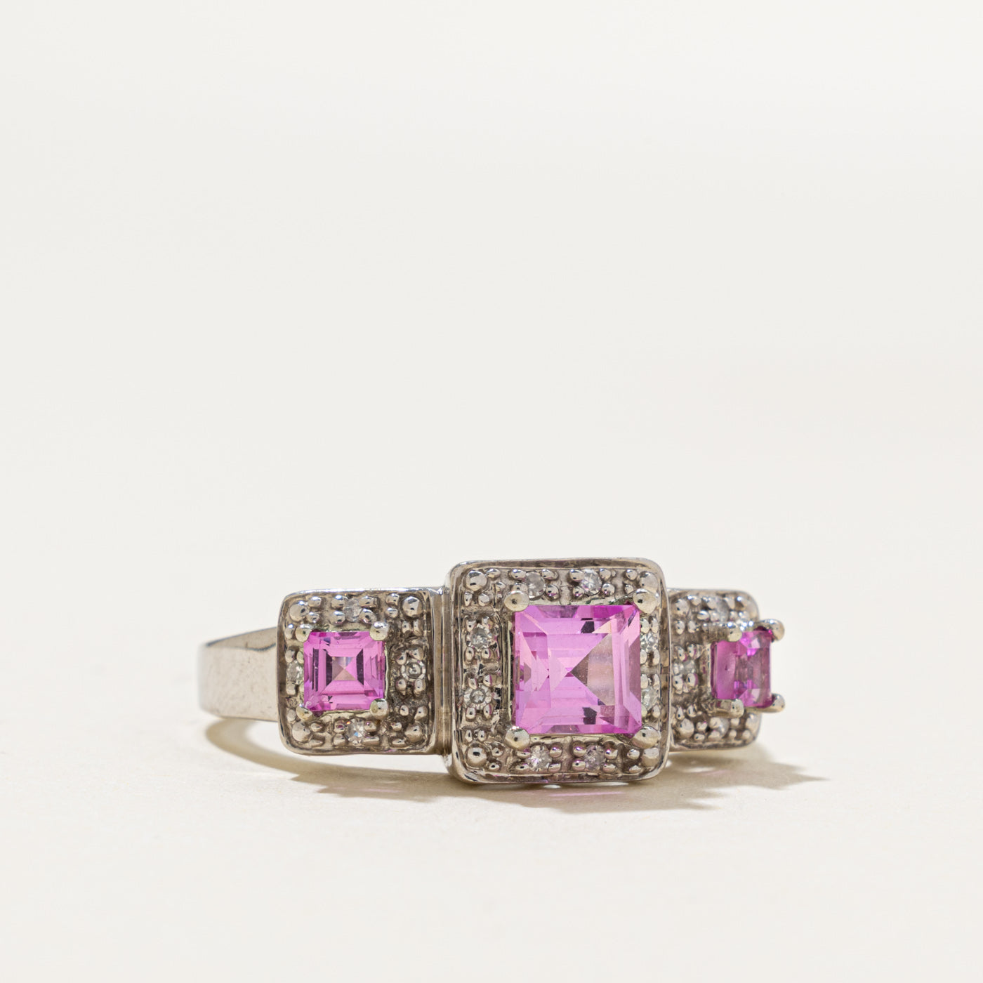 10k Three Stone Synthetic Sapphire & Diamond Halo Ring | 1.20ctw, 0.08ctw | SZ 8.25