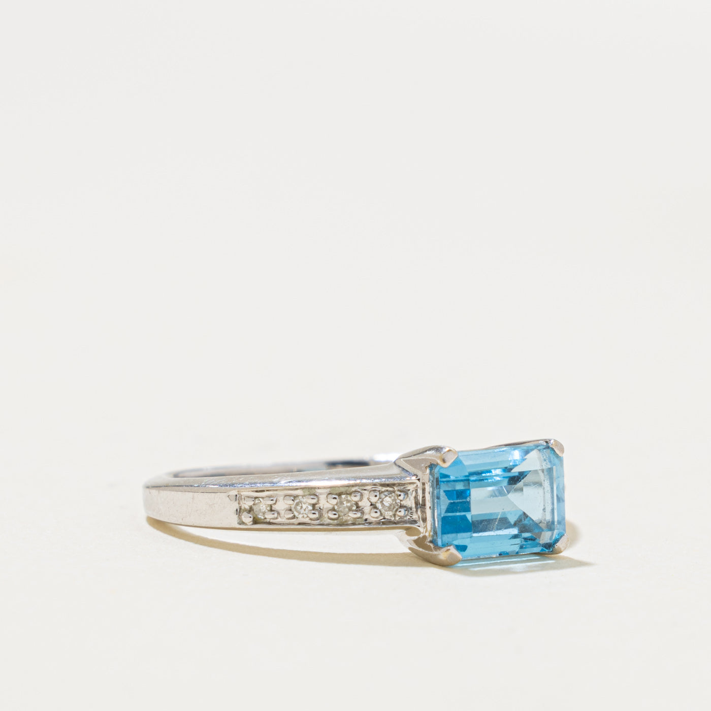 14k East West Blue Topaz & Diamond Accented Ring | 1.00ct, 0.04ctw | SZ 7