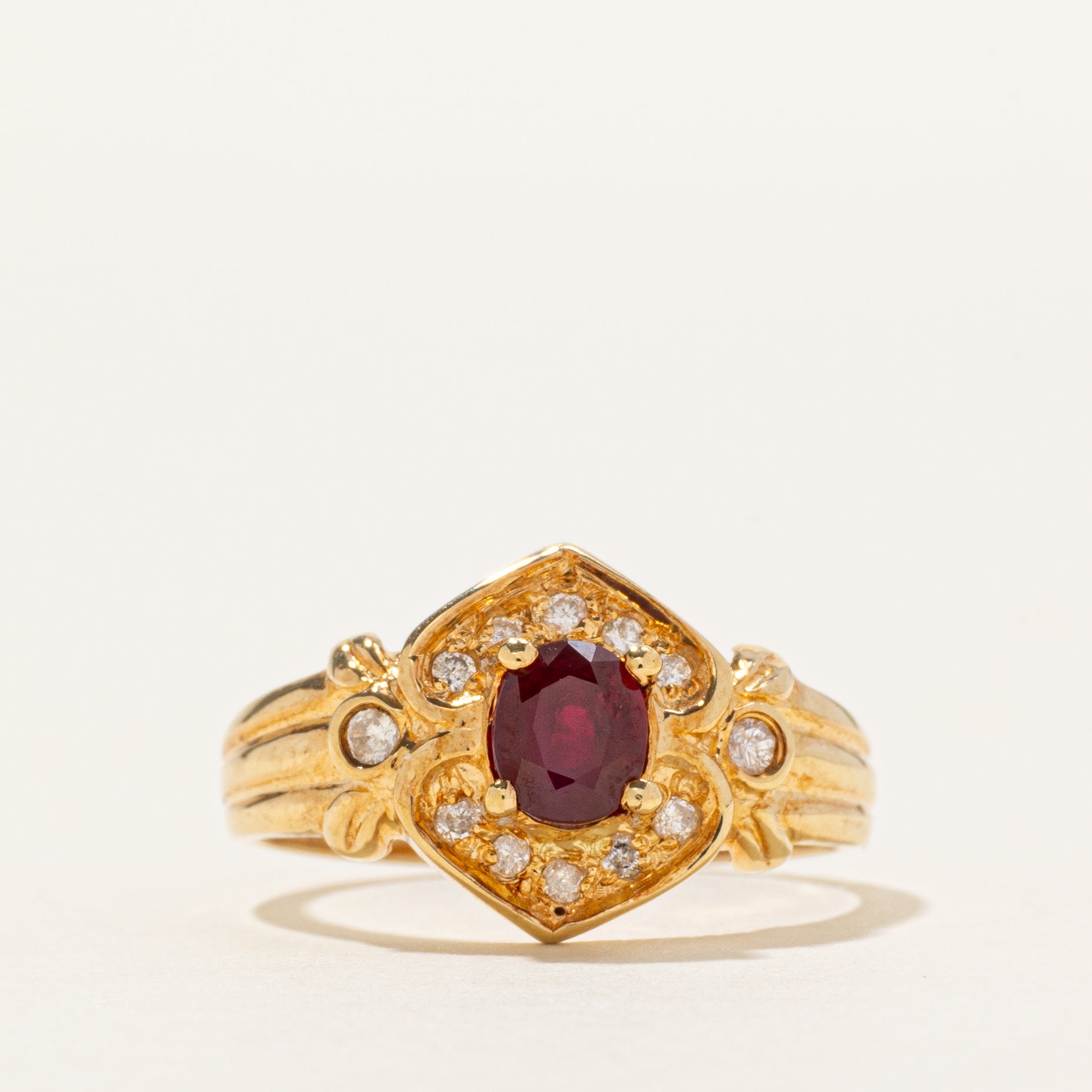 18k Ruby & Diamond Halo Grooved Ring | 0.75ct, 0.08ctw | SZ 6