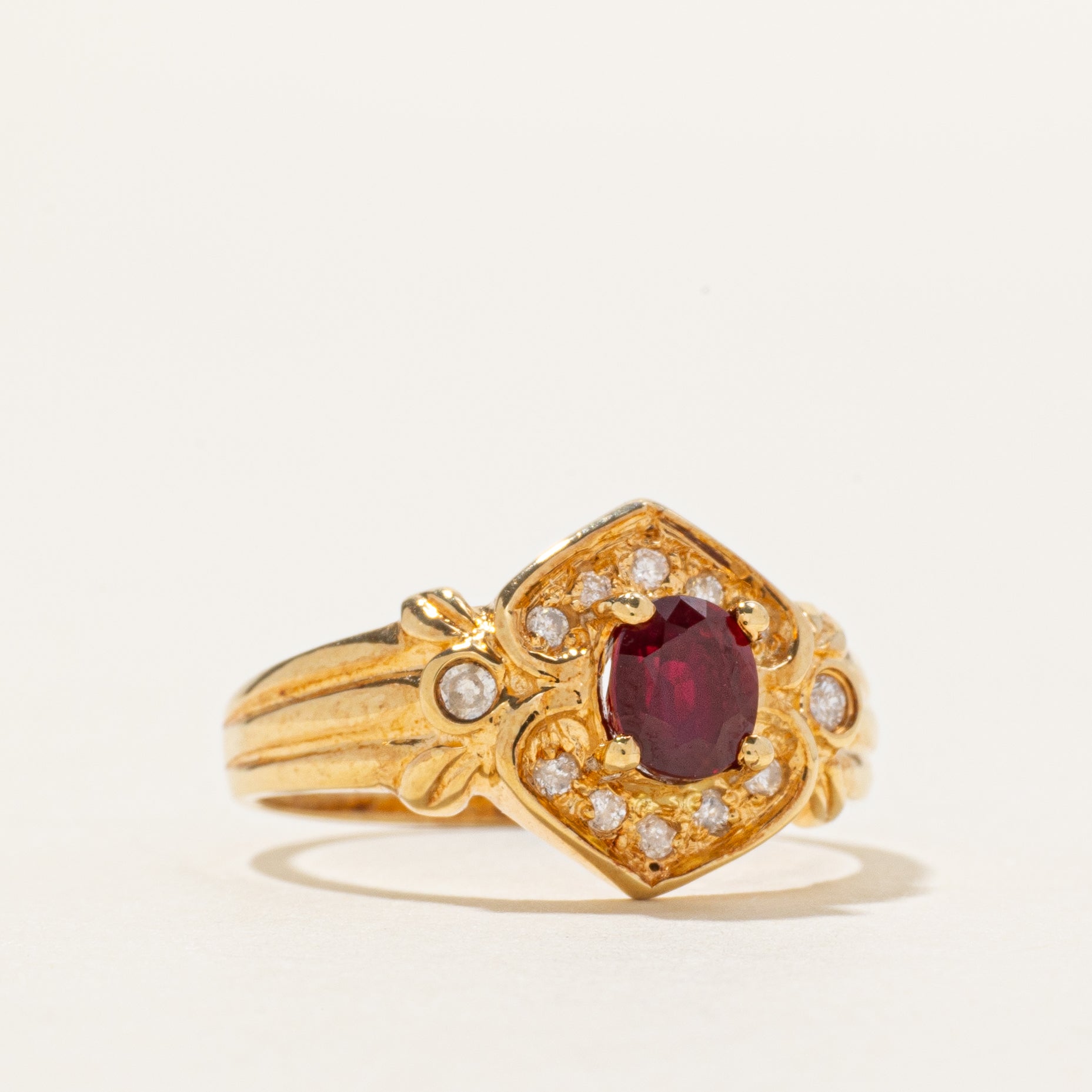 18k Ruby & Diamond Halo Grooved Ring | 0.75ct, 0.08ctw | SZ 6