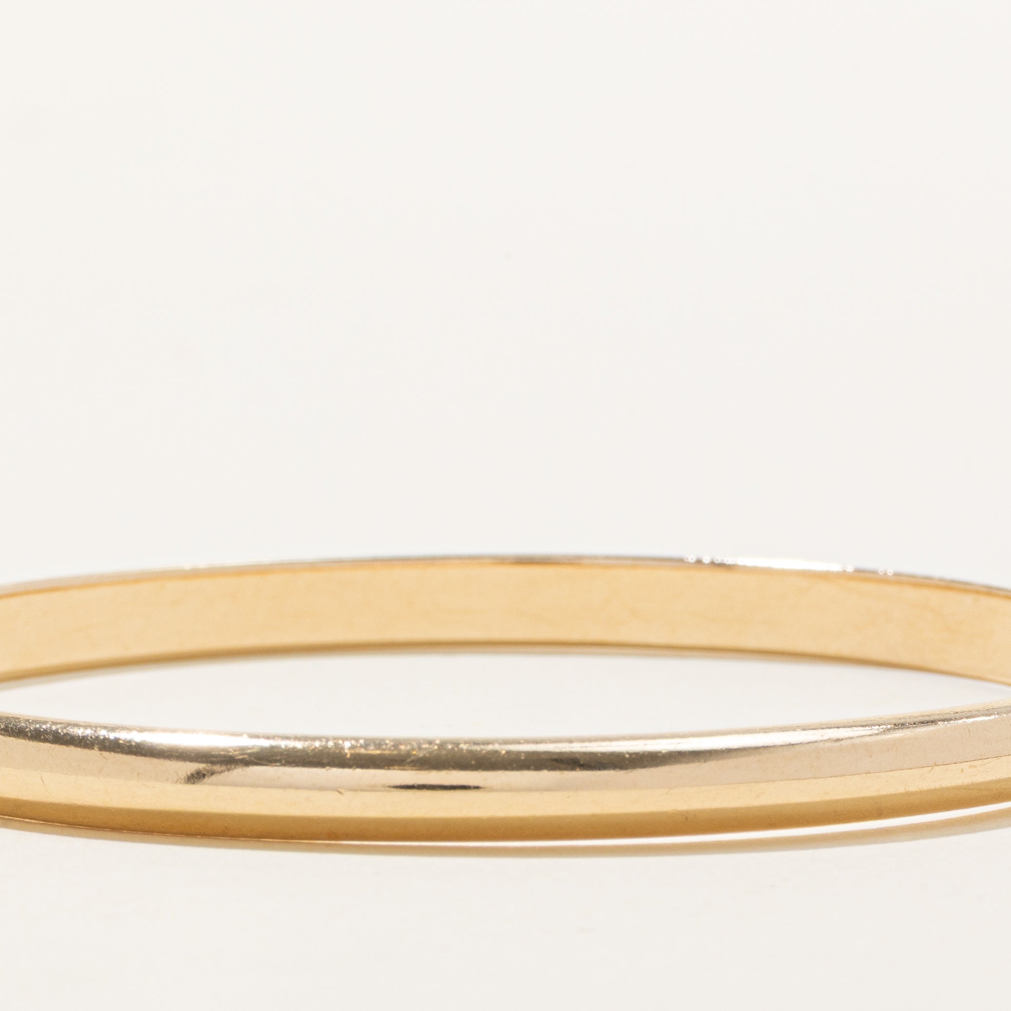 'Tiffany & Co' Vintage 14k Yellow Gold Plain Bangle | 7"