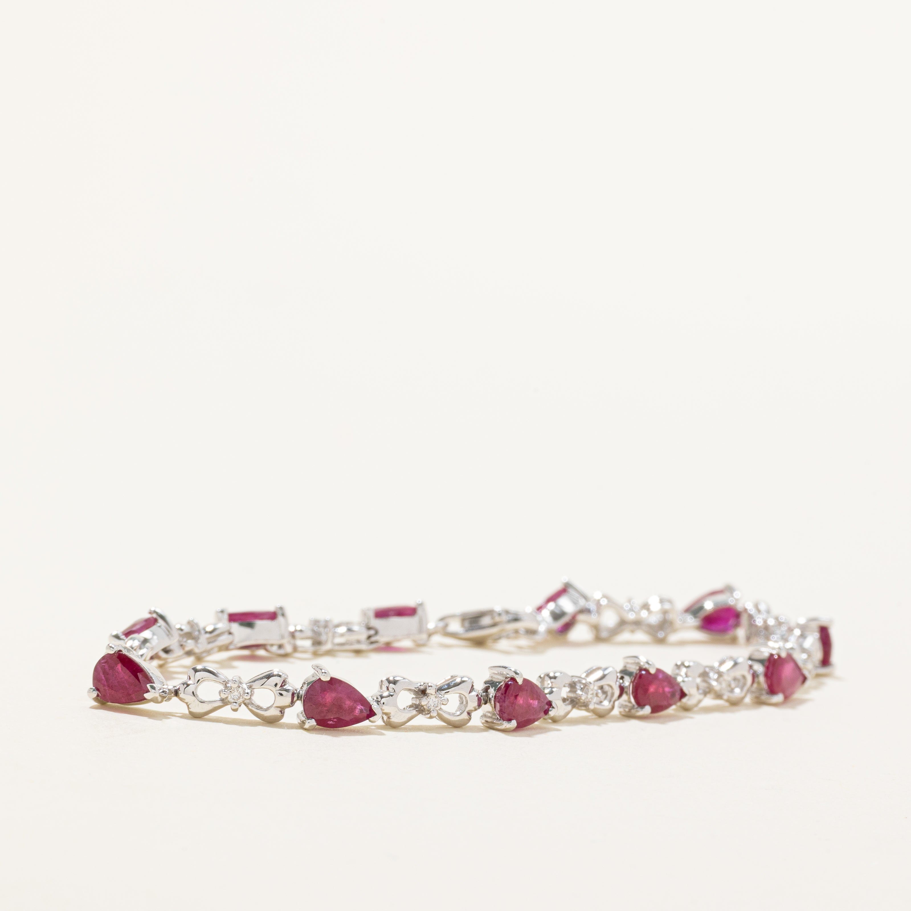 18k White Gold Pear Cut Ruby & Diamond Bracelet | 5.00ctw, 0.10ctw | 7"