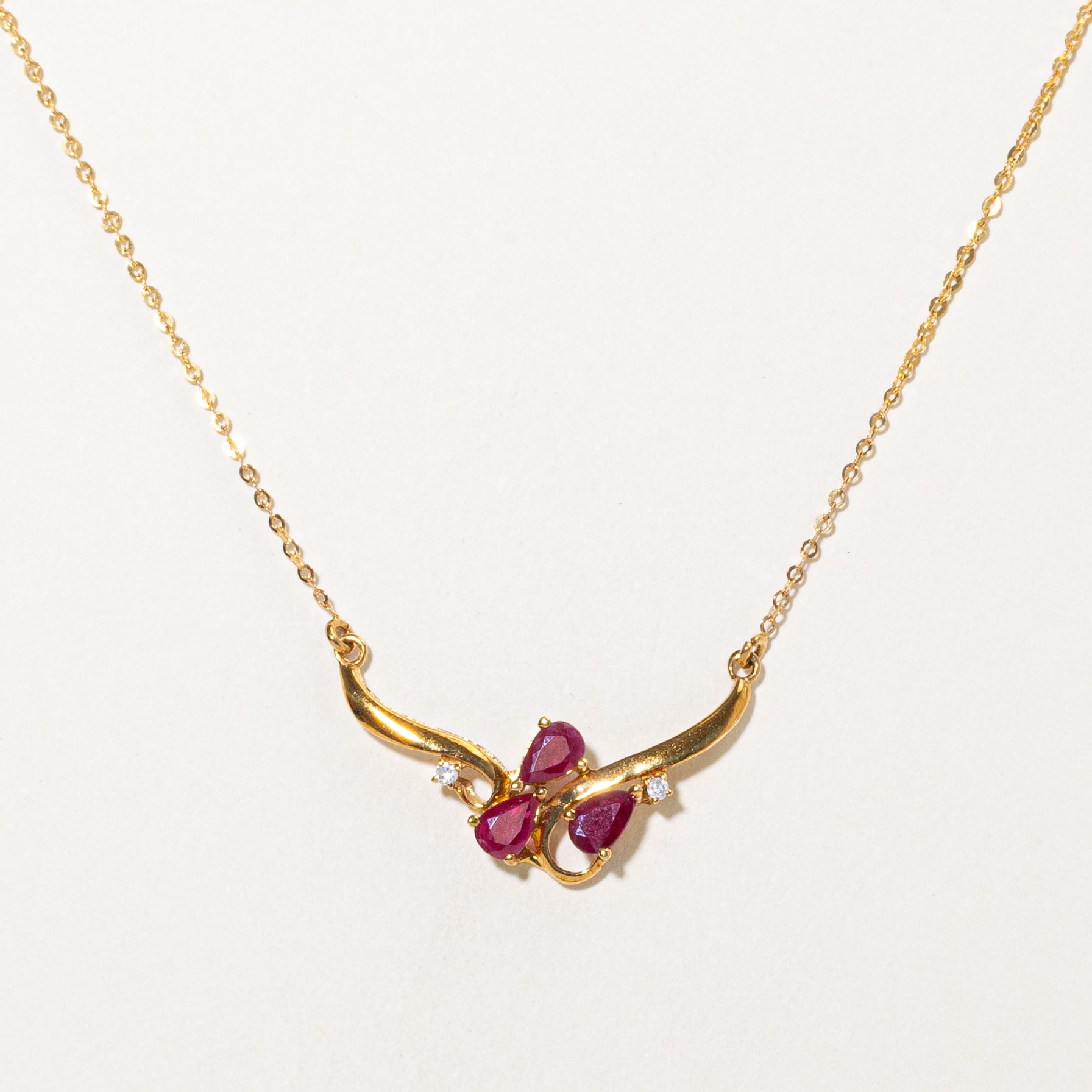 18k Pear Cut Ruby & Diamond Pendant Necklace | 0.75ctw, 0.04ctw | 17"