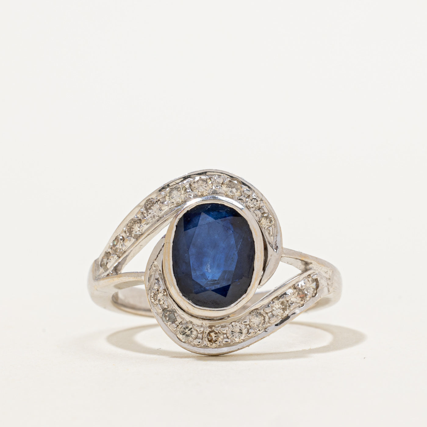 T.K. Anderson's Sapphire and Diamond Bypass Ring | 1.60 ct Sapphire, 0.38ctw DIamonds SZ 7 |