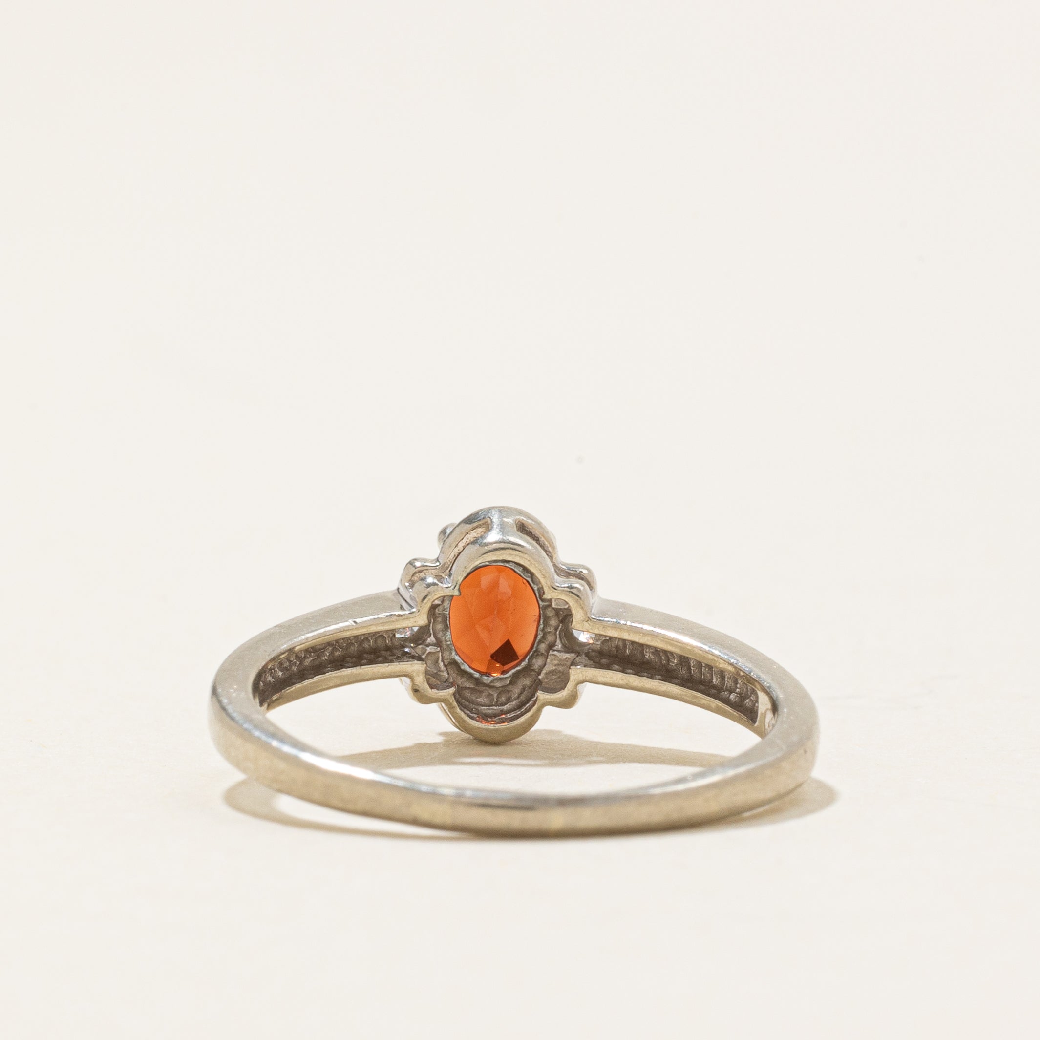 Oval Cut Garnet & Diamond Accented Ring | 0.44ct, 0.02ctw | SZ 5.5 |