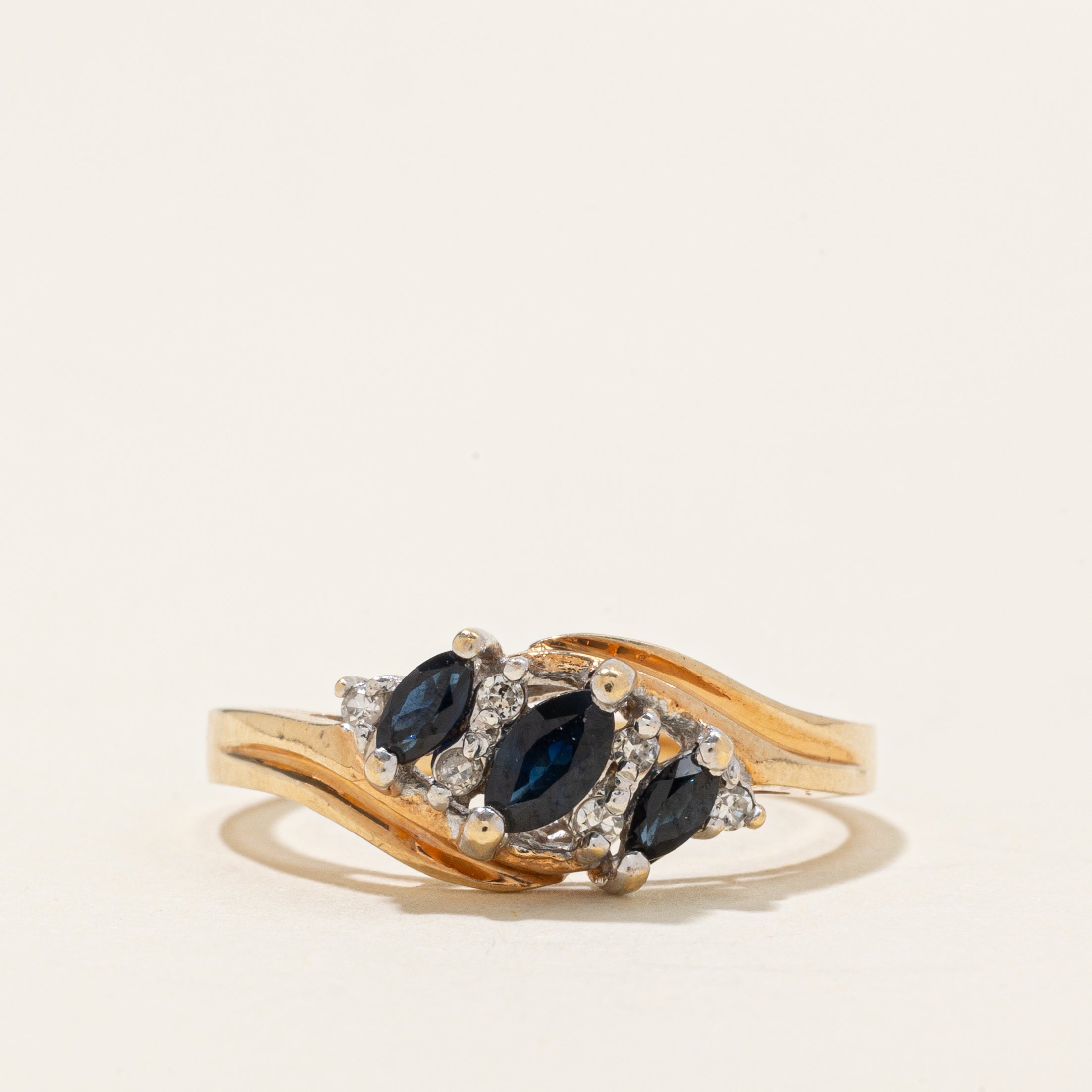 Three Stone Marquise Cut Sapphire & Diamond Bypass Ring | 0/5ctw, 0.03ctw | SZ 7.5 |