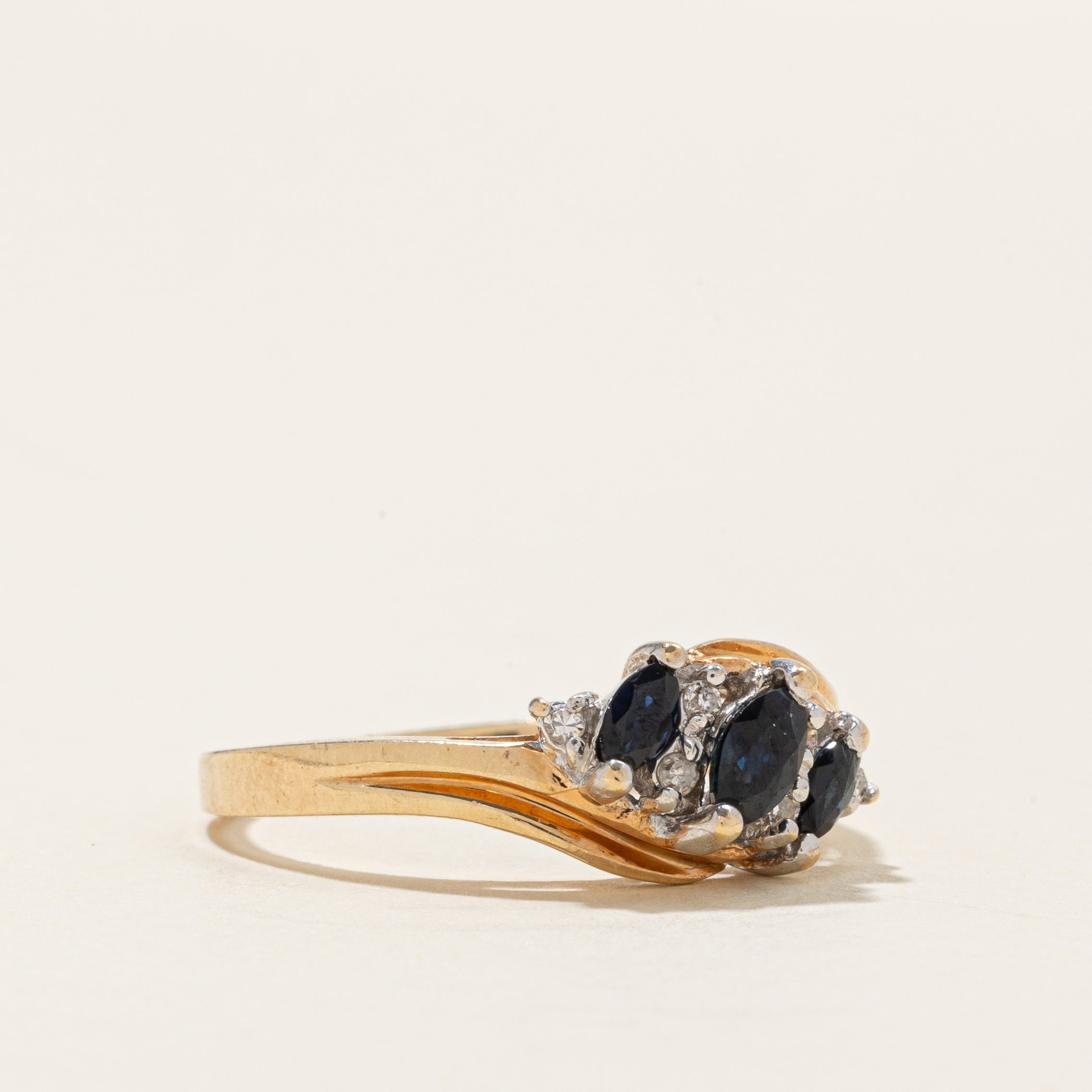Three Stone Marquise Cut Sapphire & Diamond Bypass Ring | 0/5ctw, 0.03ctw | SZ 7.5 |