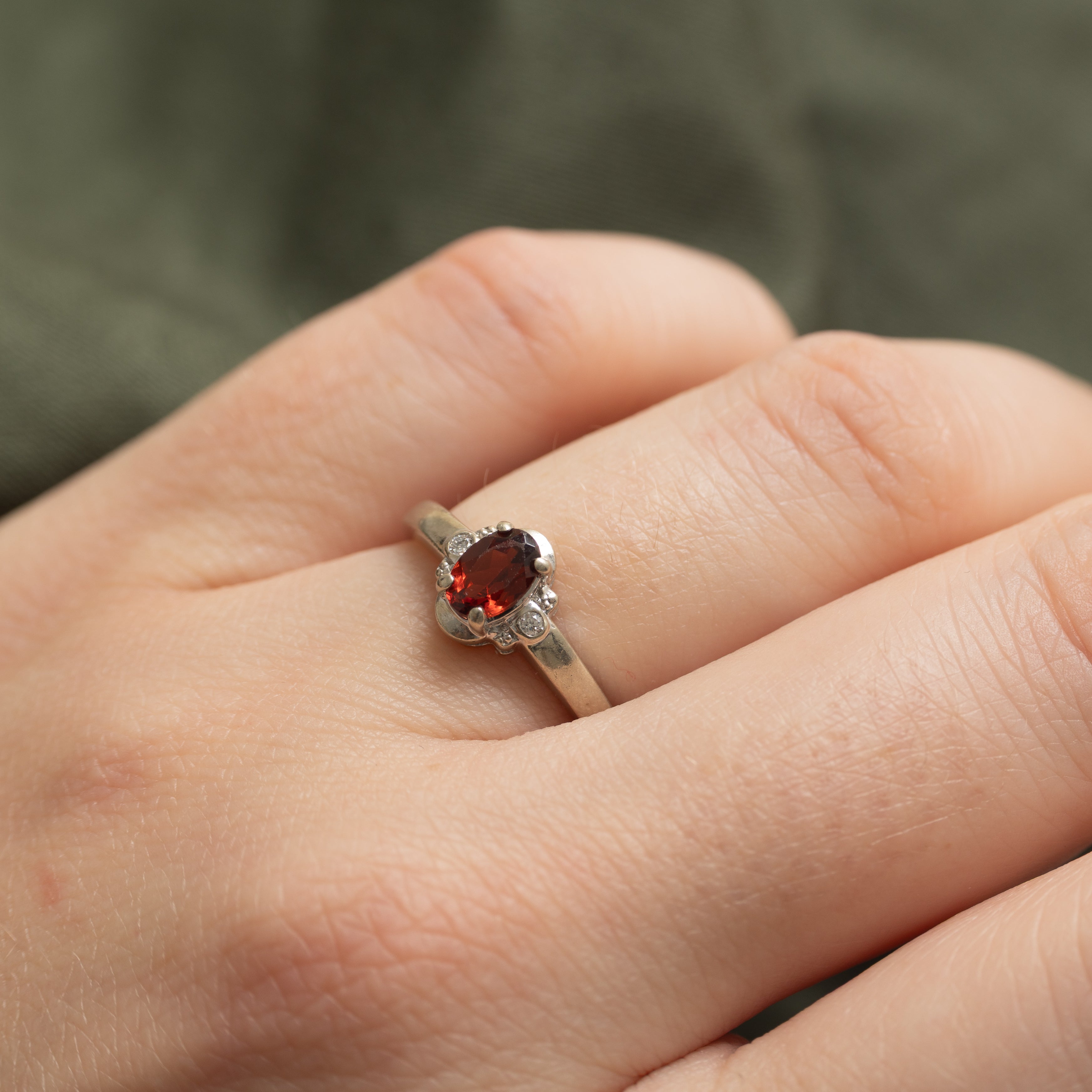 Oval Cut Garnet & Diamond Accented Ring | 0.44ct, 0.02ctw | SZ 5.5 |