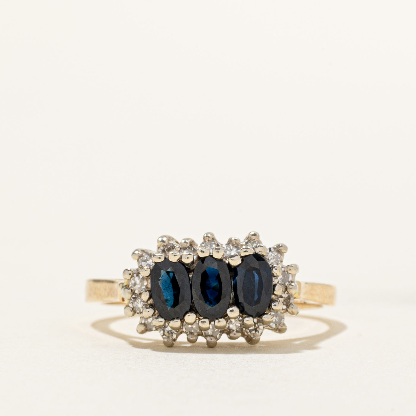 Oval Cut Three Stone Sapphire & Diamond Petal Halo Ring | 0.90ctw, 0.18ctw | SZ 8