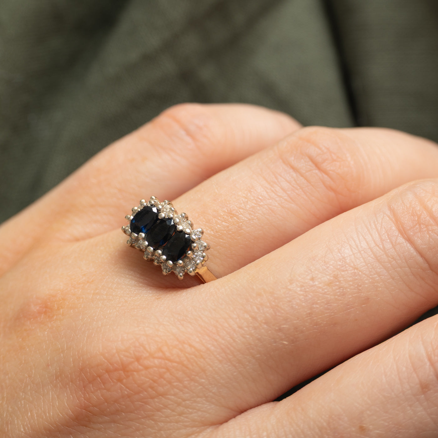 Oval Cut Three Stone Sapphire & Diamond Petal Halo Ring | 0.90ctw, 0.18ctw | SZ 8