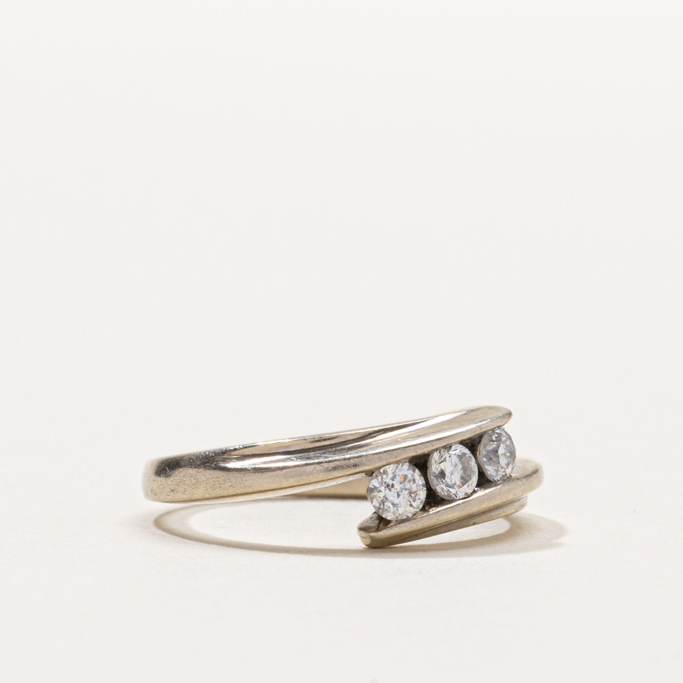Canadian 10k Three Stone Diamond Bypass Ring | 0.21ctw | SZ 4.75