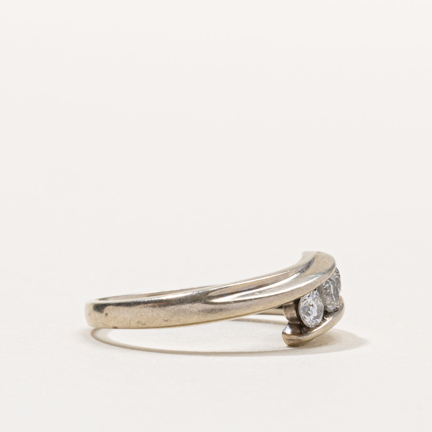 Canadian 10k Three Stone Diamond Bypass Ring | 0.21ctw | SZ 4.75