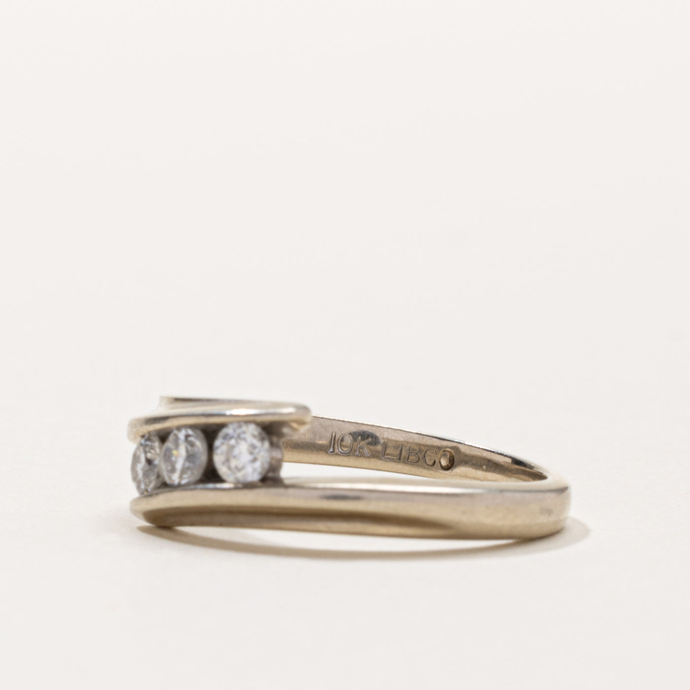 Canadian 10k Three Stone Diamond Bypass Ring | 0.21ctw | SZ 4.75