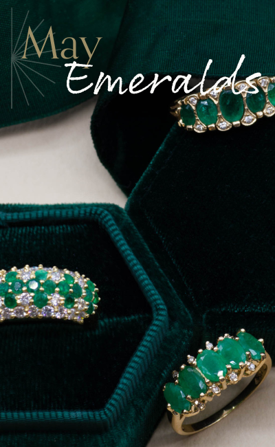 Image of vintage, antique, unique emerald rings in emerald green velvet boxes. Text reads: May Emeralds
