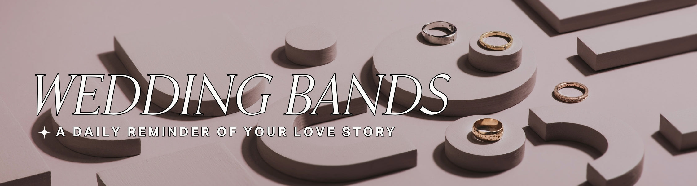 image of multiple wedding bands on soft pink shaped objects . title text reads: wedding bands, a daily reminder of your love story
