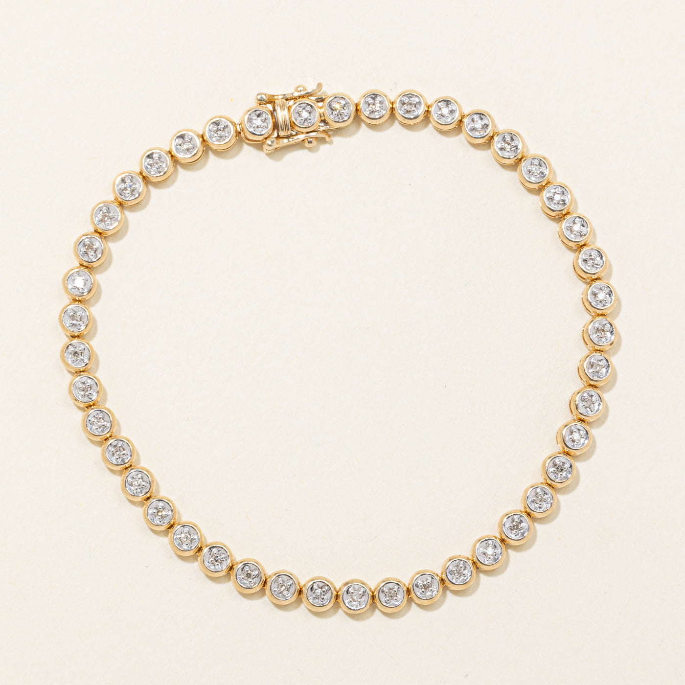 10K Illusion Set Diamond Tennis Bracelet | 0.22ctw | 7"