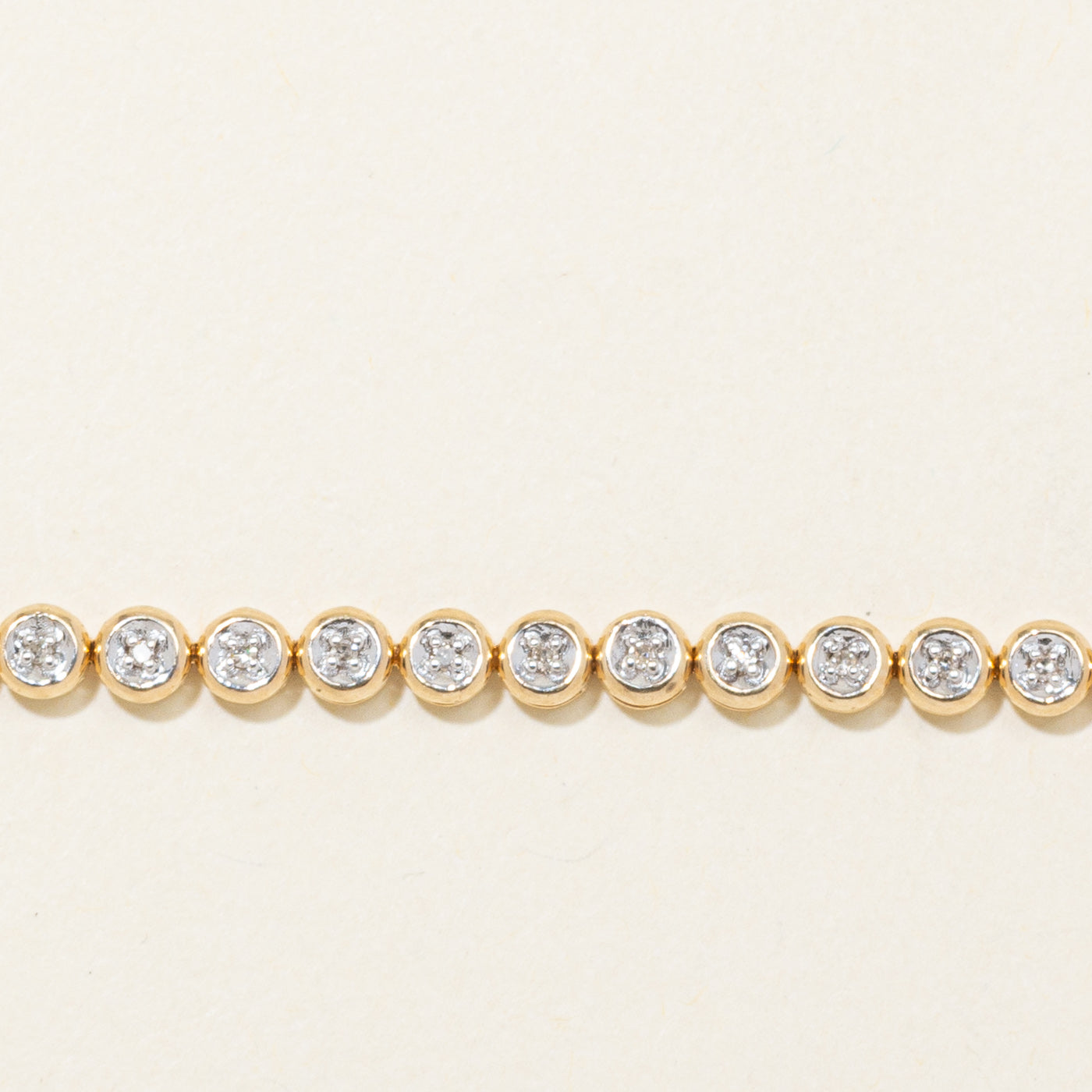 10K Illusion Set Diamond Tennis Bracelet | 0.22ctw | 7"