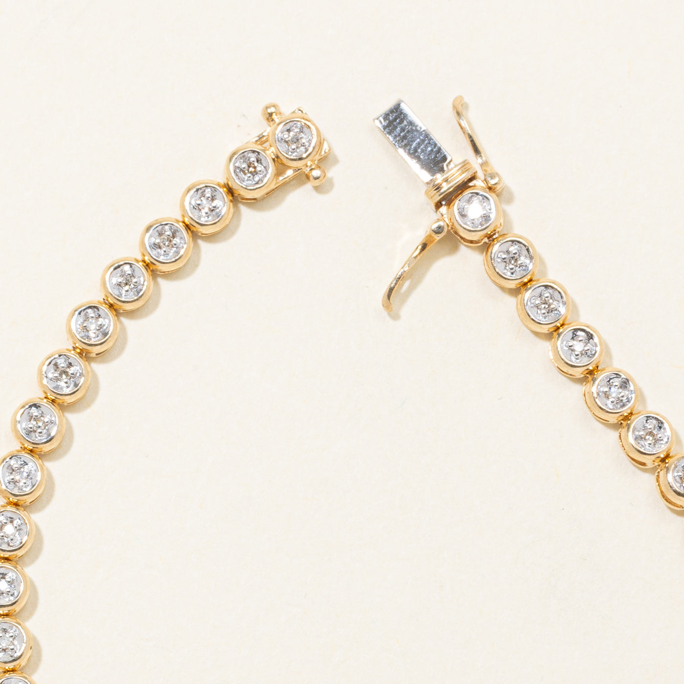 10K Illusion Set Diamond Tennis Bracelet | 0.22ctw | 7"